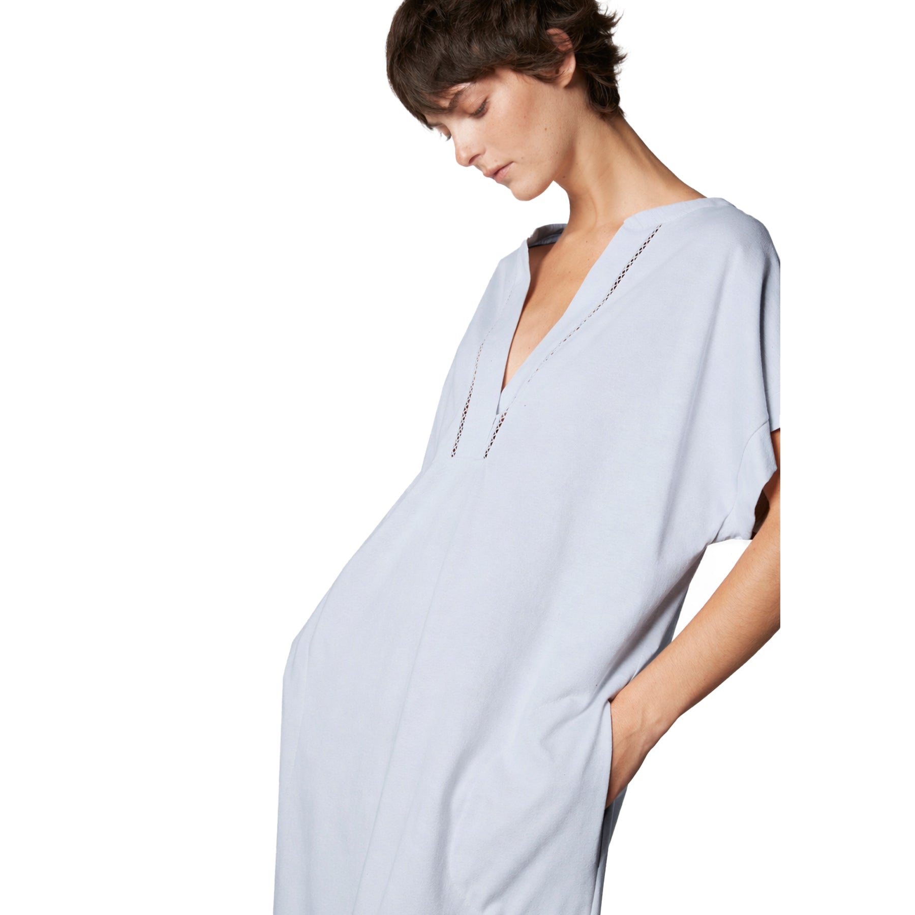 Light blue short-sleeve nightdress with V-neck and stitch detail, relaxed fit with side pockets on model