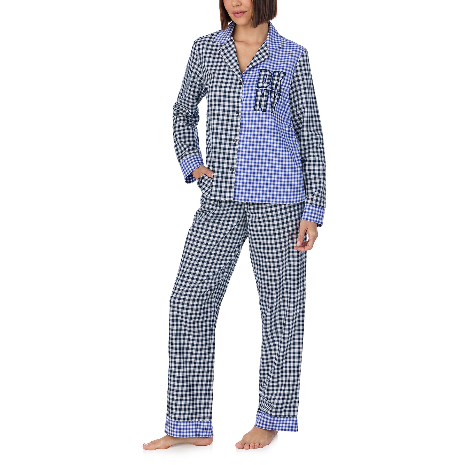Classic 2-piece button up pyjama set in blue and black checkered gingham print. Front view 2 on model.