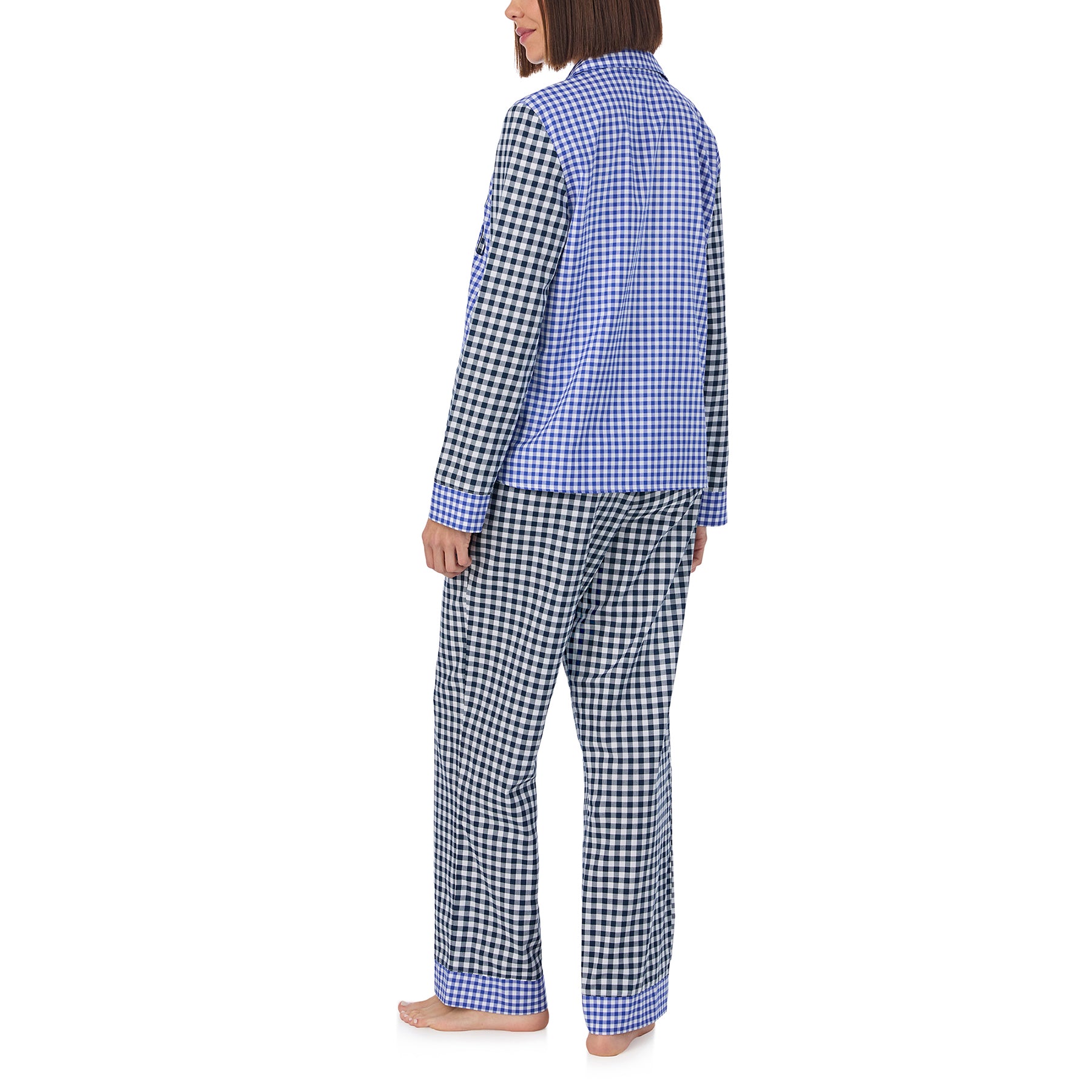Classic 2-piece button up pyjama set in blue and black checkered gingham print. Rear view on model.