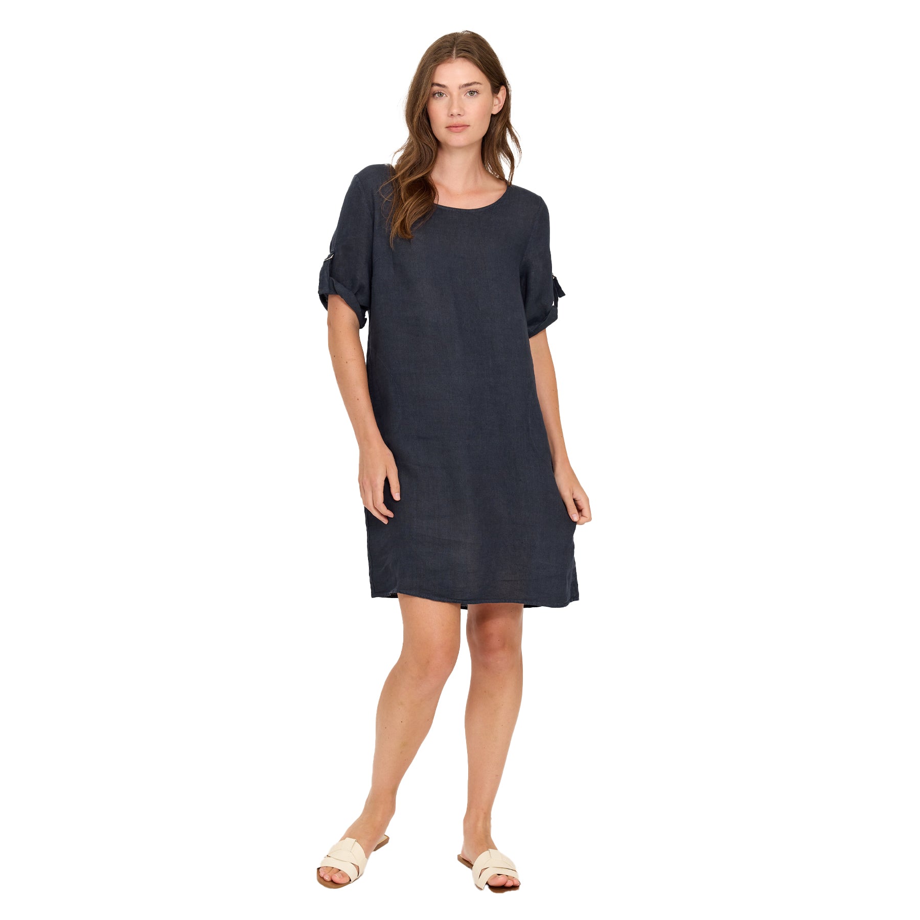 Woman wearing a navy blue dress on a white background