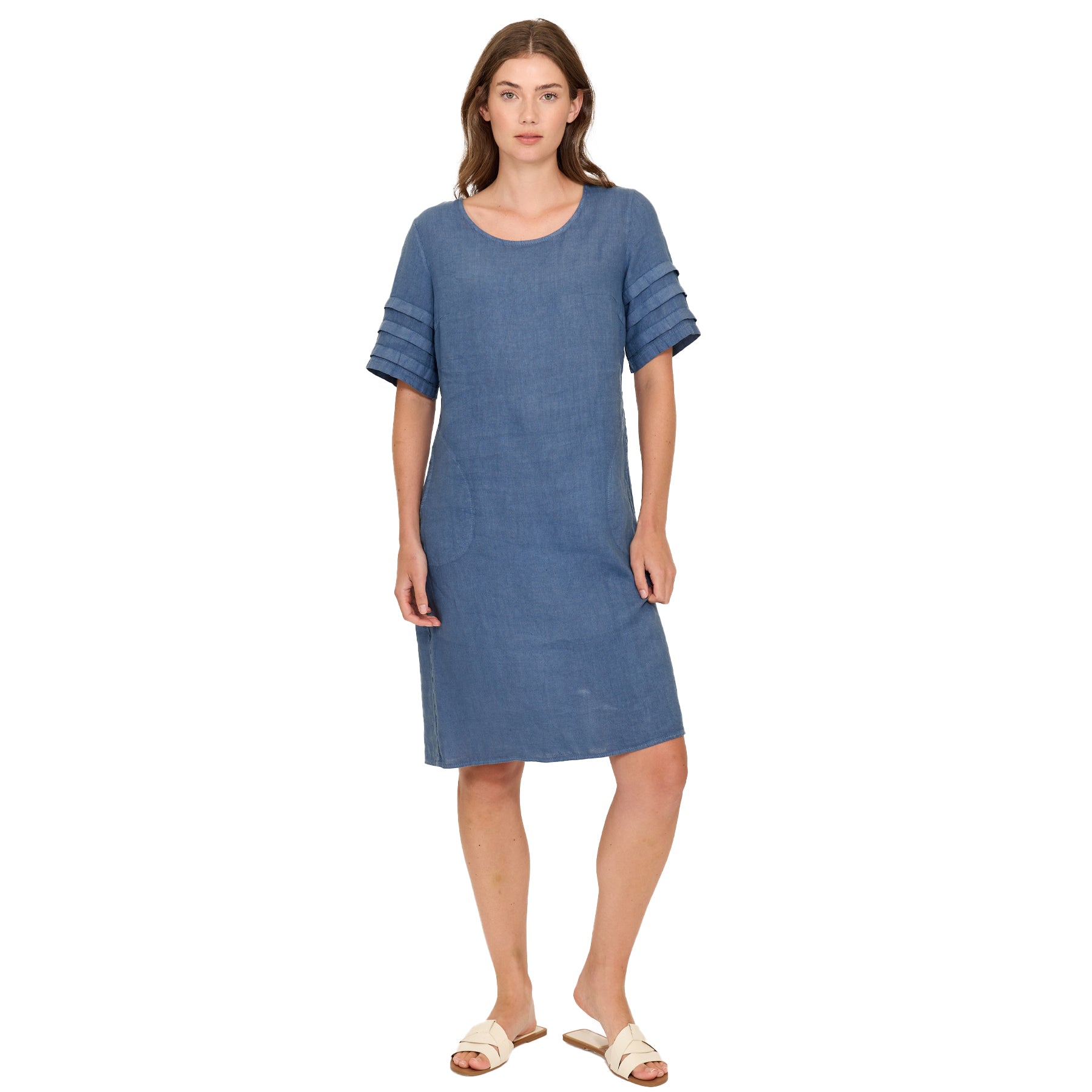Capri blue short sleeve dress on a model, featuring a relaxed straight silhouette with a scoop neckline and layered sleeve detailing for a modern, easy look