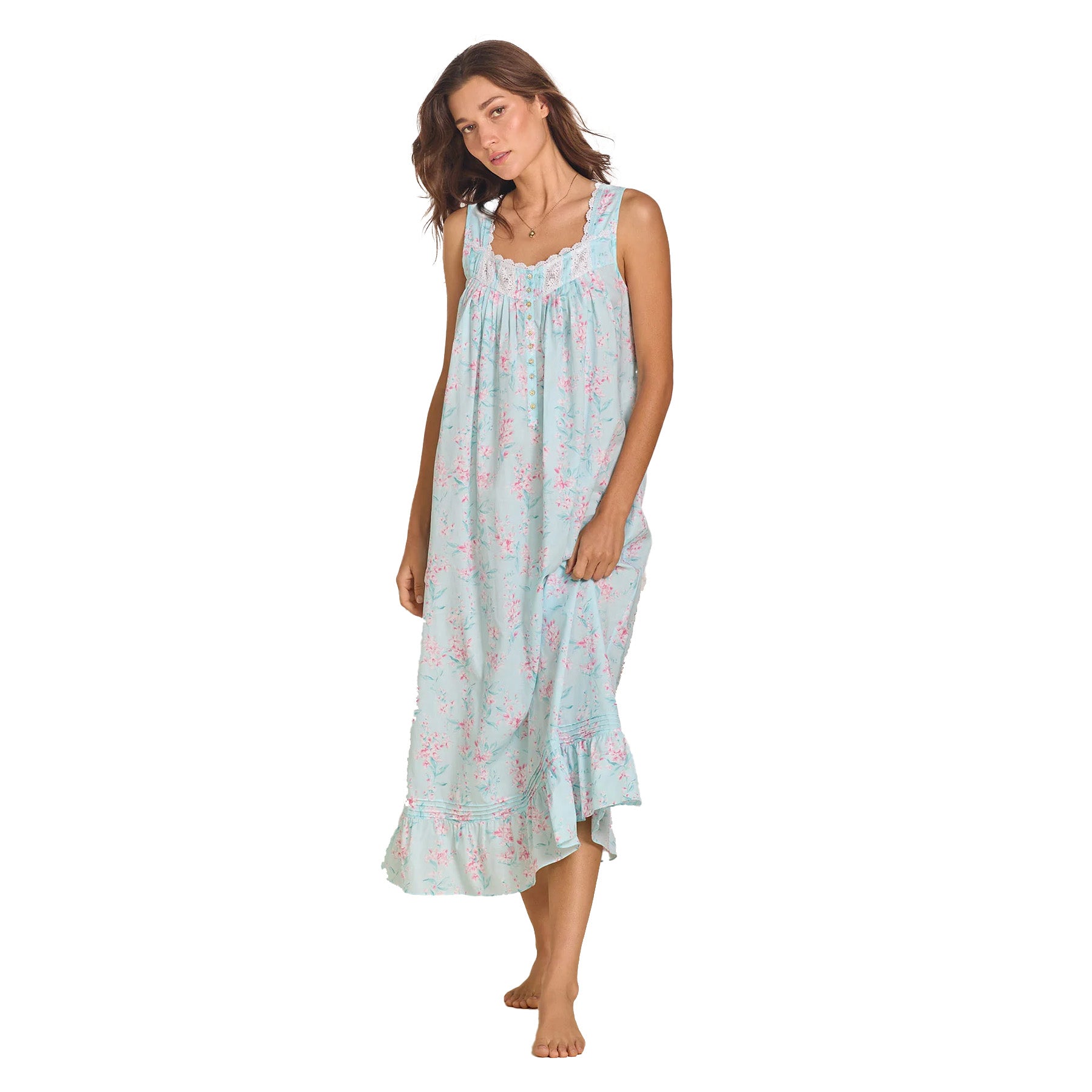 The same model gently lifting the hem of the long nightgown, showing the flowy silhouette and soft fabric movement.