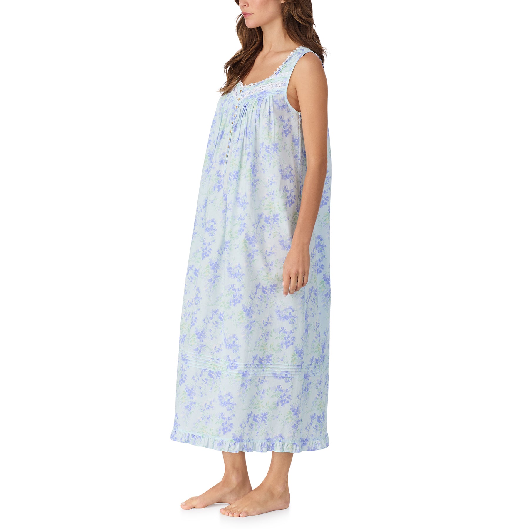 Side view of blue floral sleeveless nightdress with soft pleats, lace neckline and flowing maxi length design