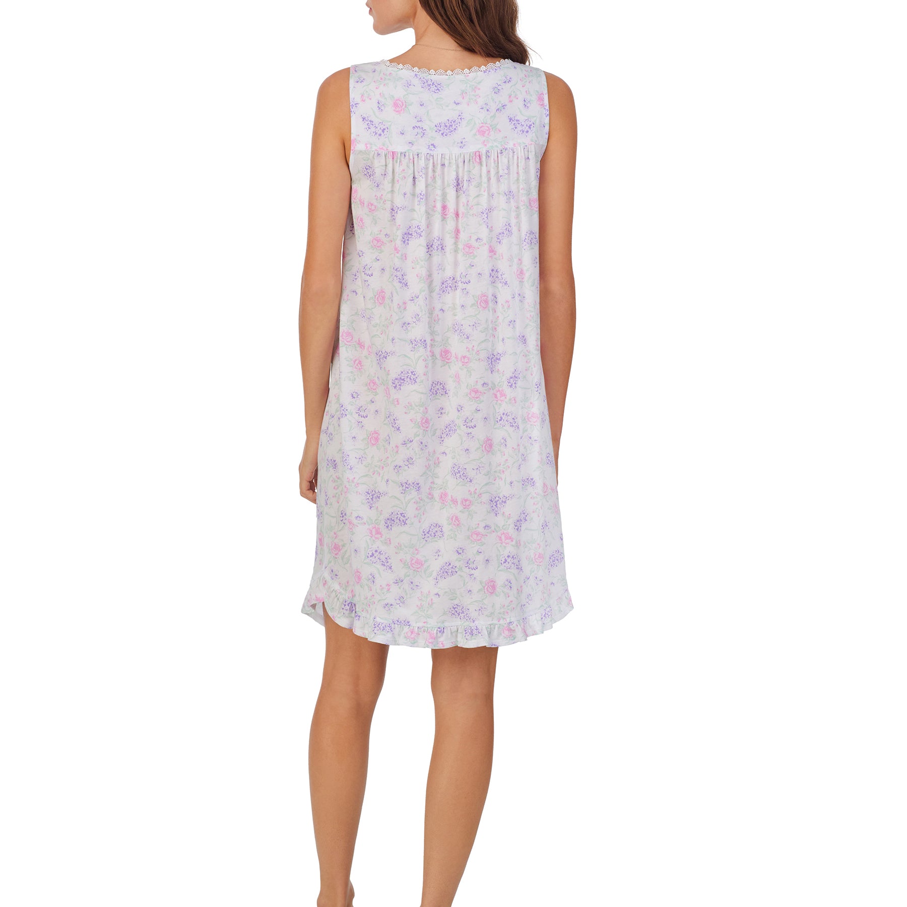 Back view of a women's floral nightshirt in a white multi hydrangea print, showcasing intricate lace trim, button detailing, and cap sleeves.