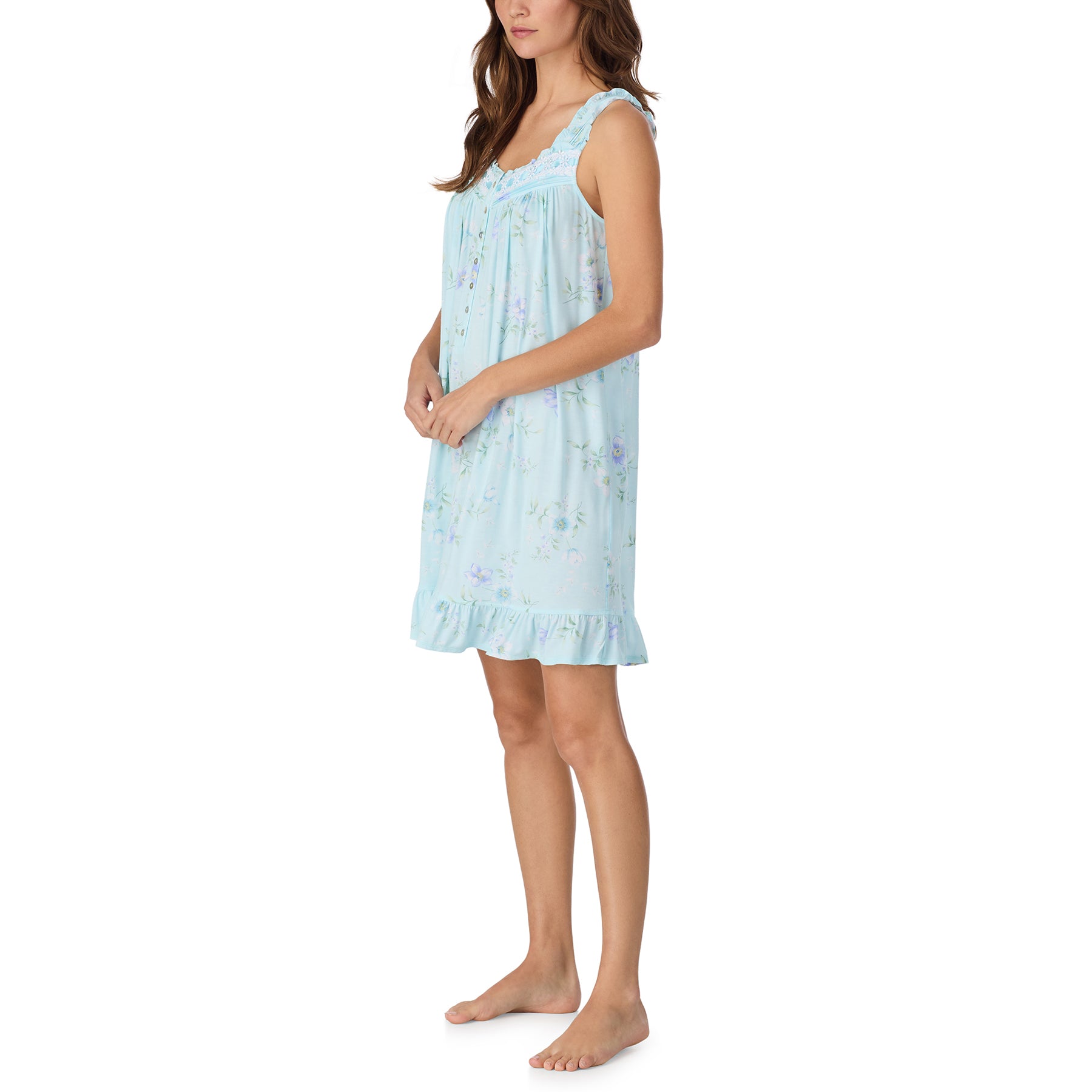 Light blue floral sleeveless chemise nightdress with lace trim, soft flowy silhouette, side view on model
