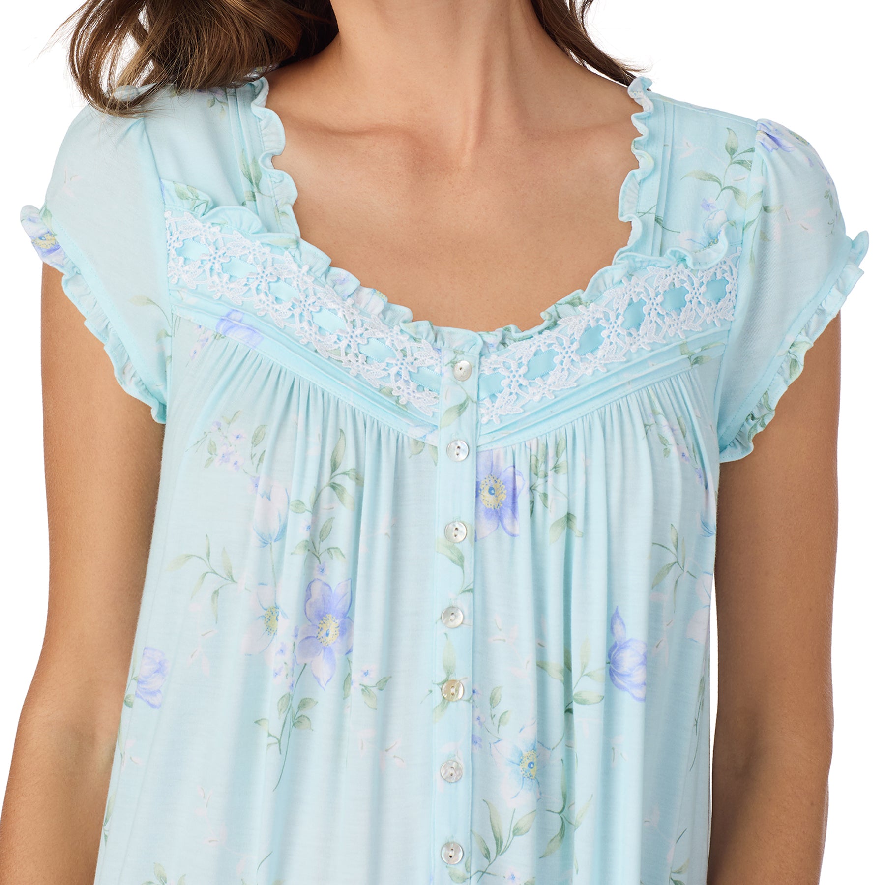 Close-up of light blue floral nightgown with lace trim neckline, ruffled sleeves and button front detail