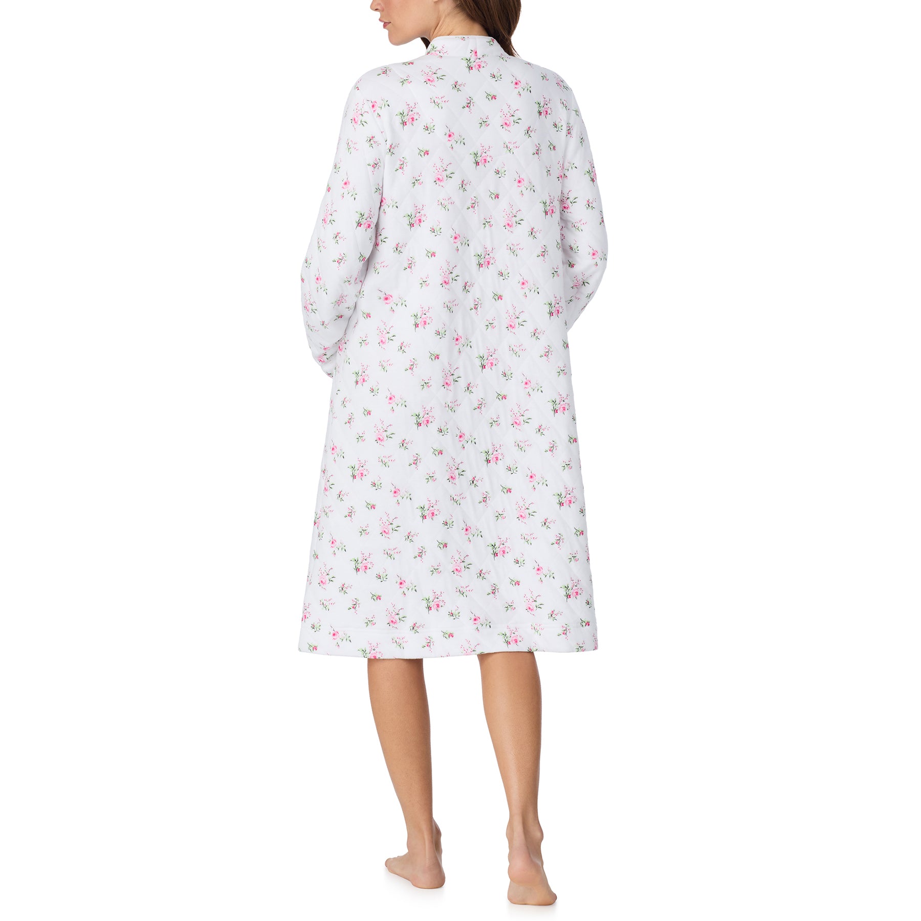 Back view of a white quilted floral robe with long sleeves and an allover pink rose pattern.