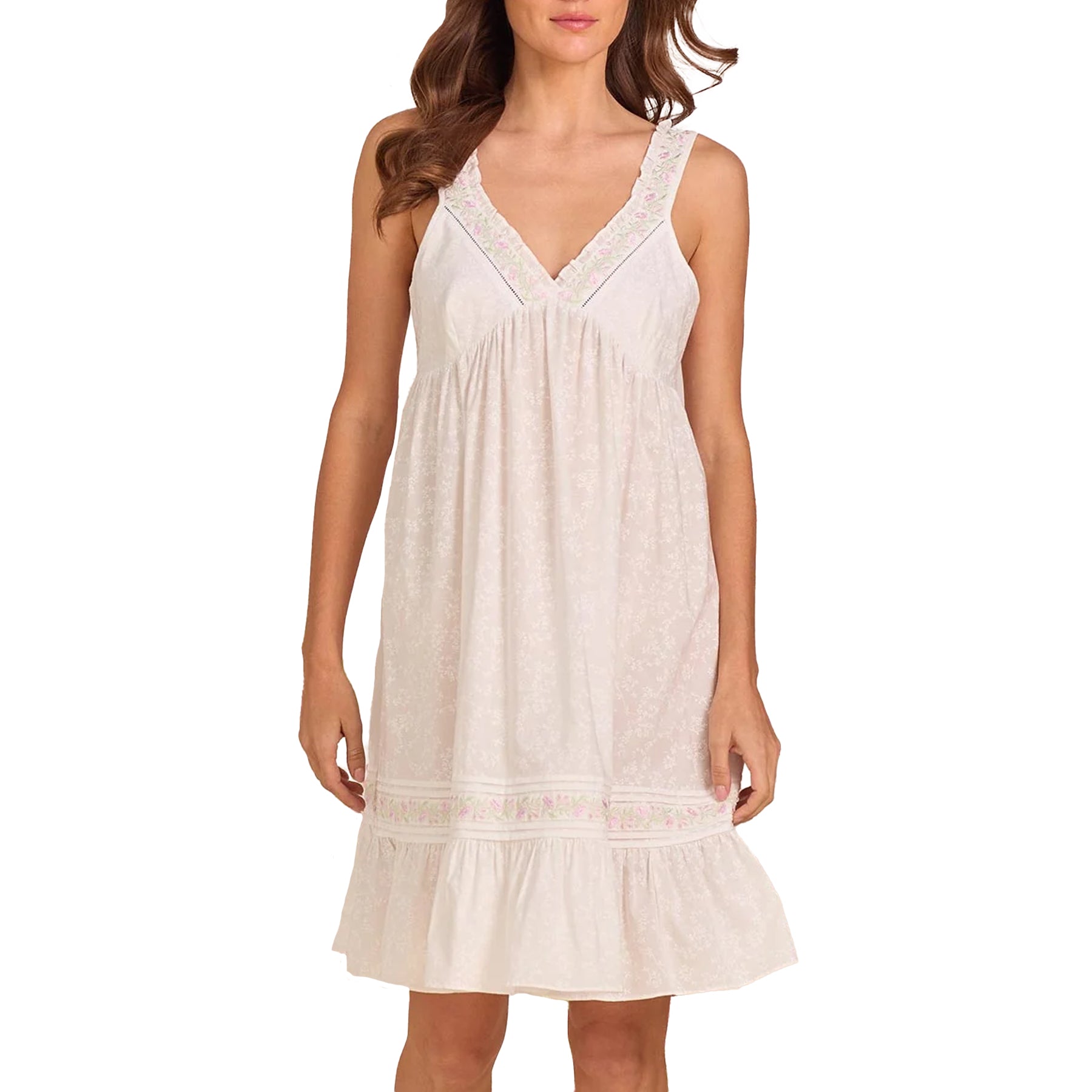Close-up of Eileen West white floral nightgown featuring embroidered V-neckline, gathered bodice, and feminine ruffle hem.