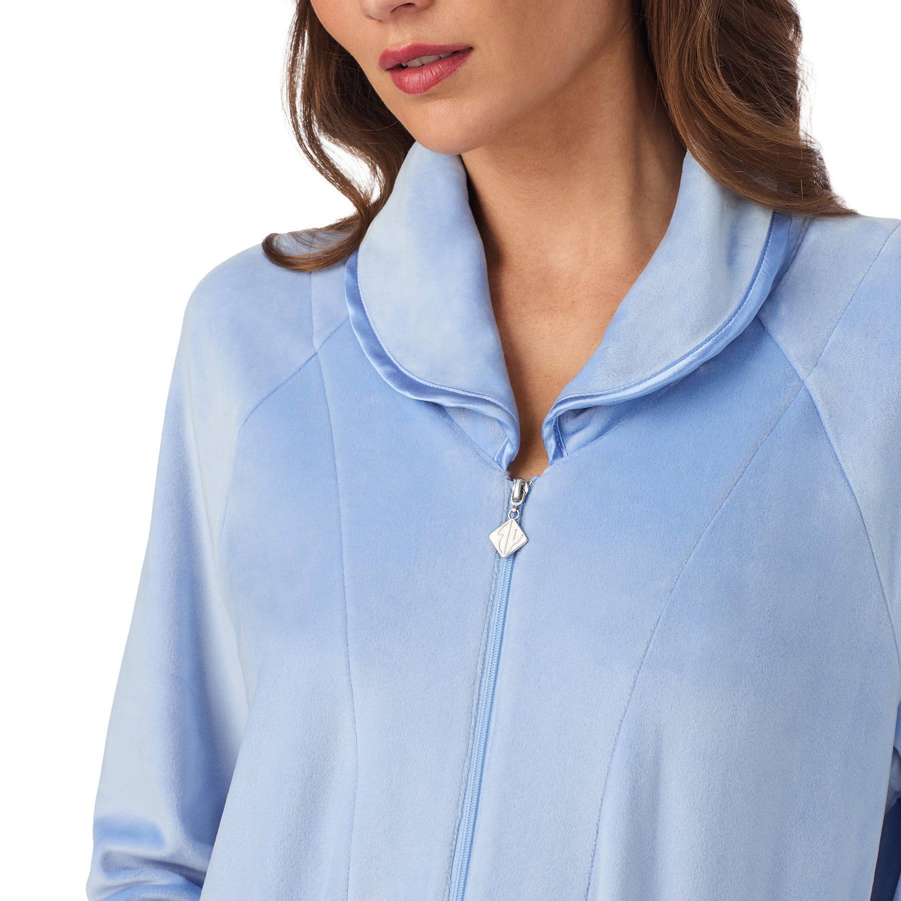 Detailed view of collar and zipper on periwinkle velour robe, highlighting soft plush texture.