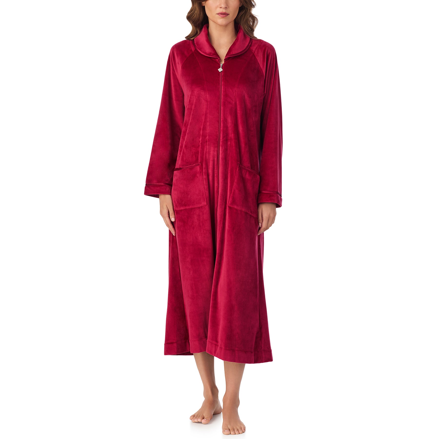 Front view of woman in full-length wine red velour robe with zip closure and front pockets.