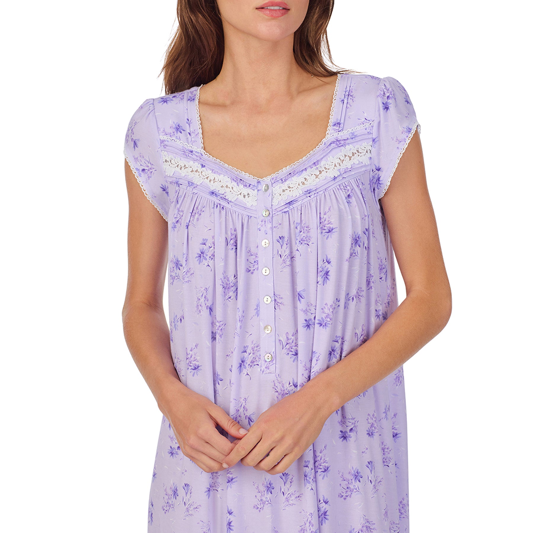 Close-Up view of a women's floral nightshirt in a lilac garden bouquet print, showcasing intricate lace trim, button detailing, and cap sleeves.