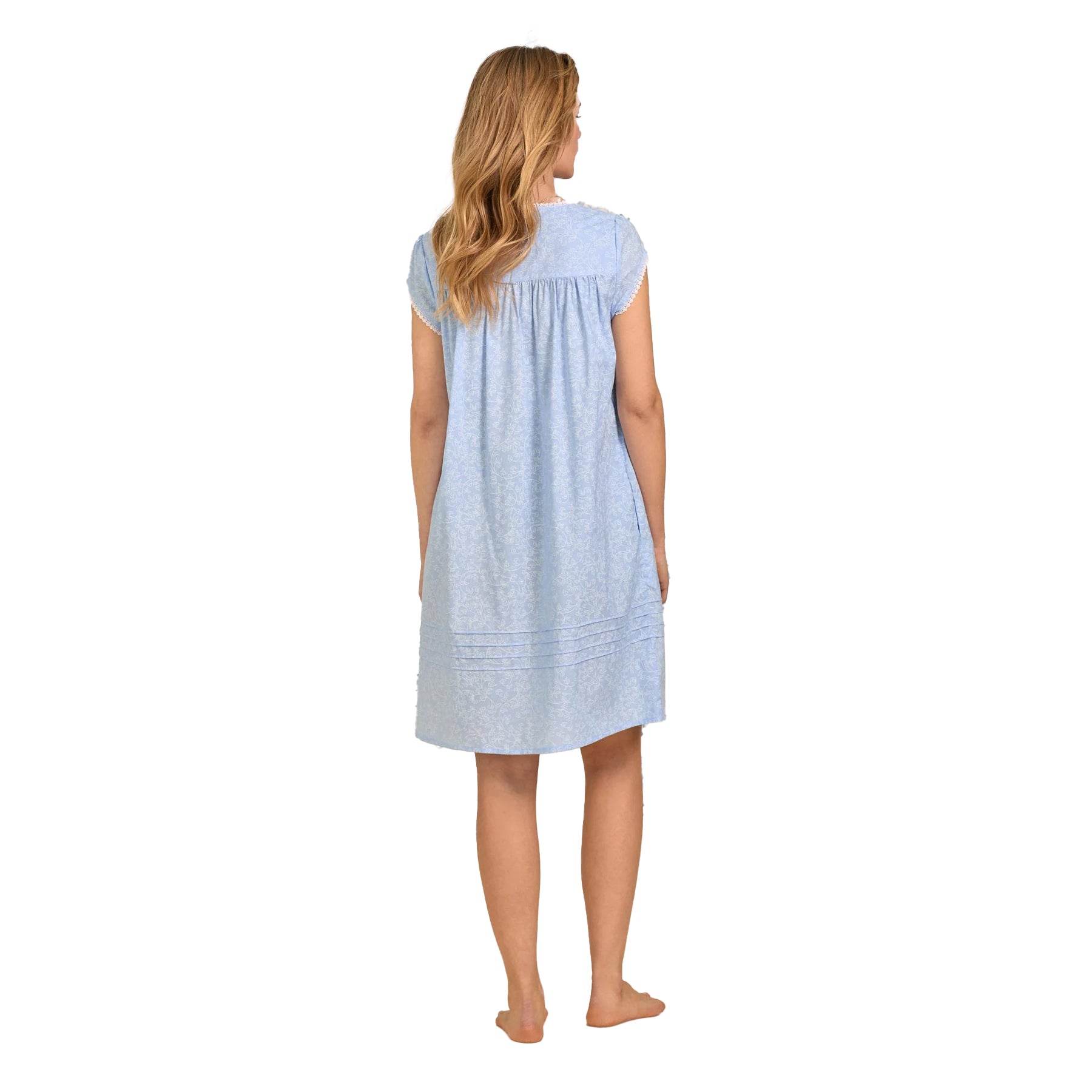 Back view of light blue cotton nightgown with subtle floral print and short sleeves, relaxed fit