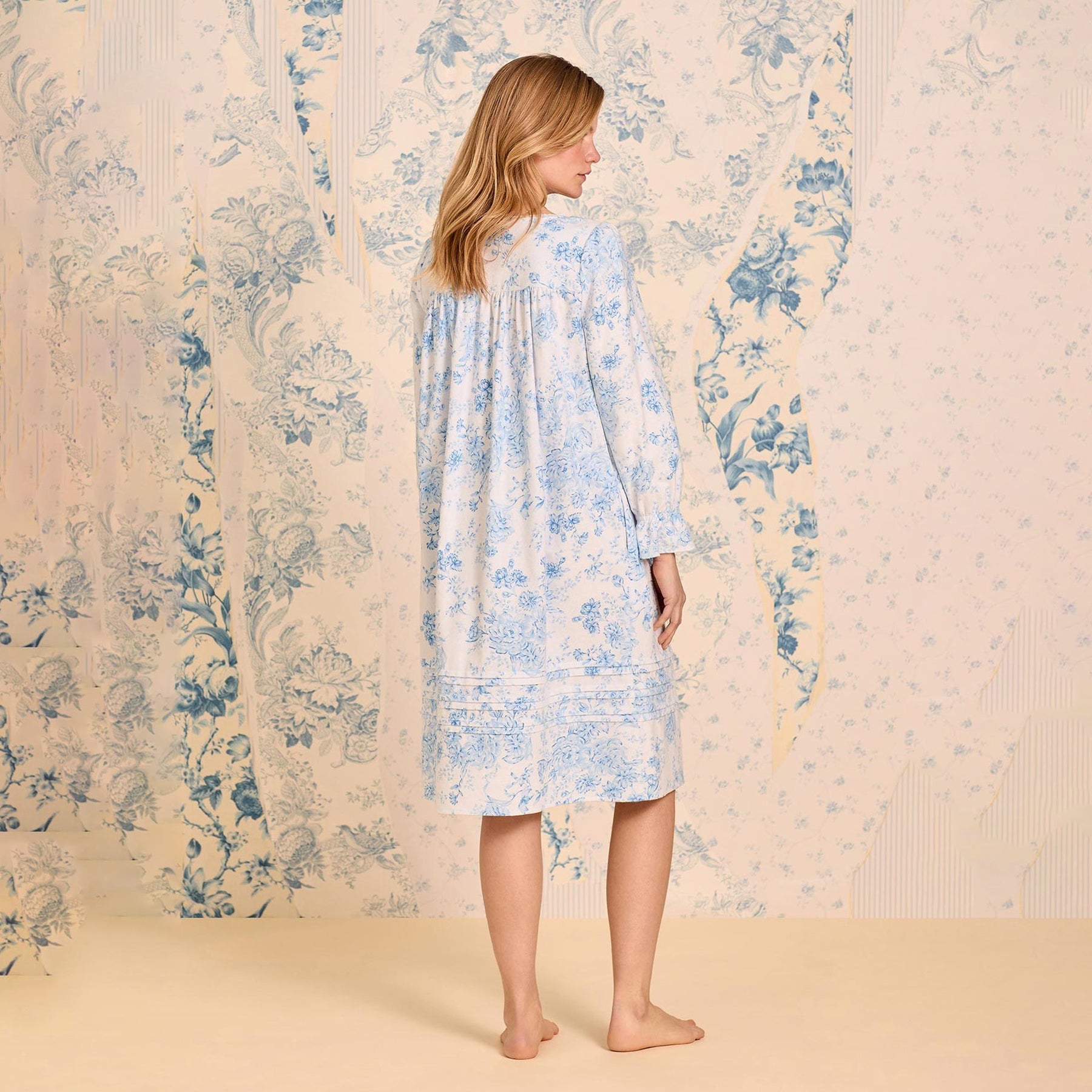 Back view of blue and white floral long-sleeve cotton nightgown by Eileen West.