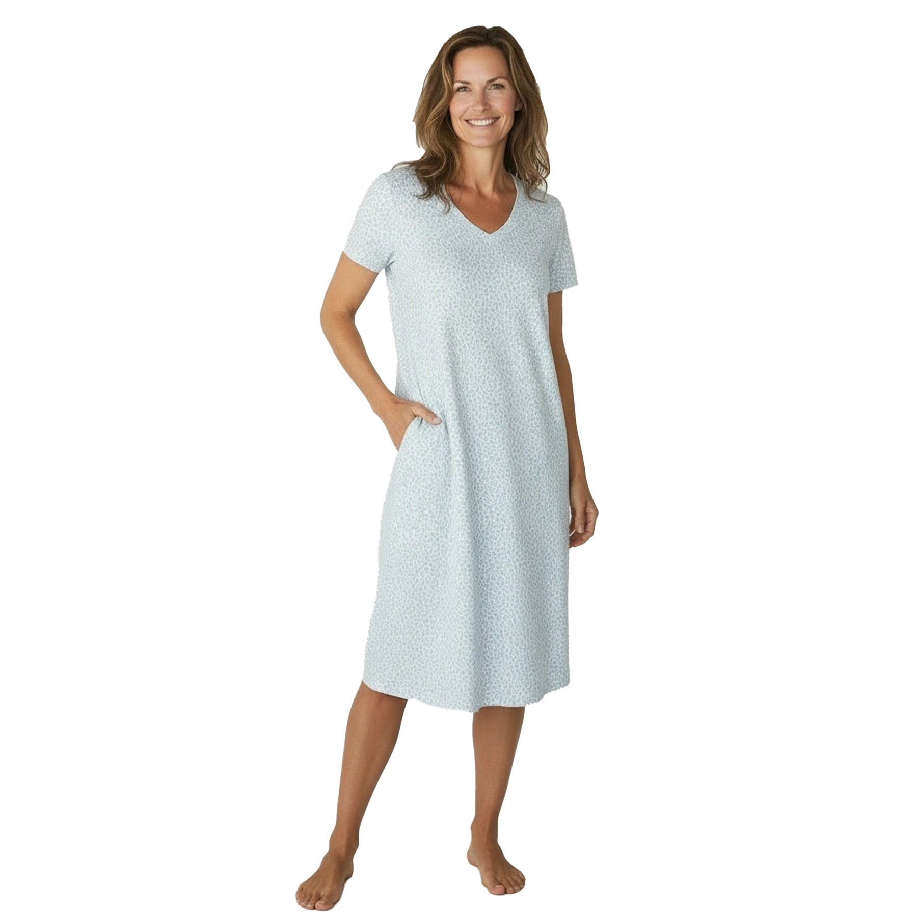 Woman wearing a light blue patterned nightshirt on a white background