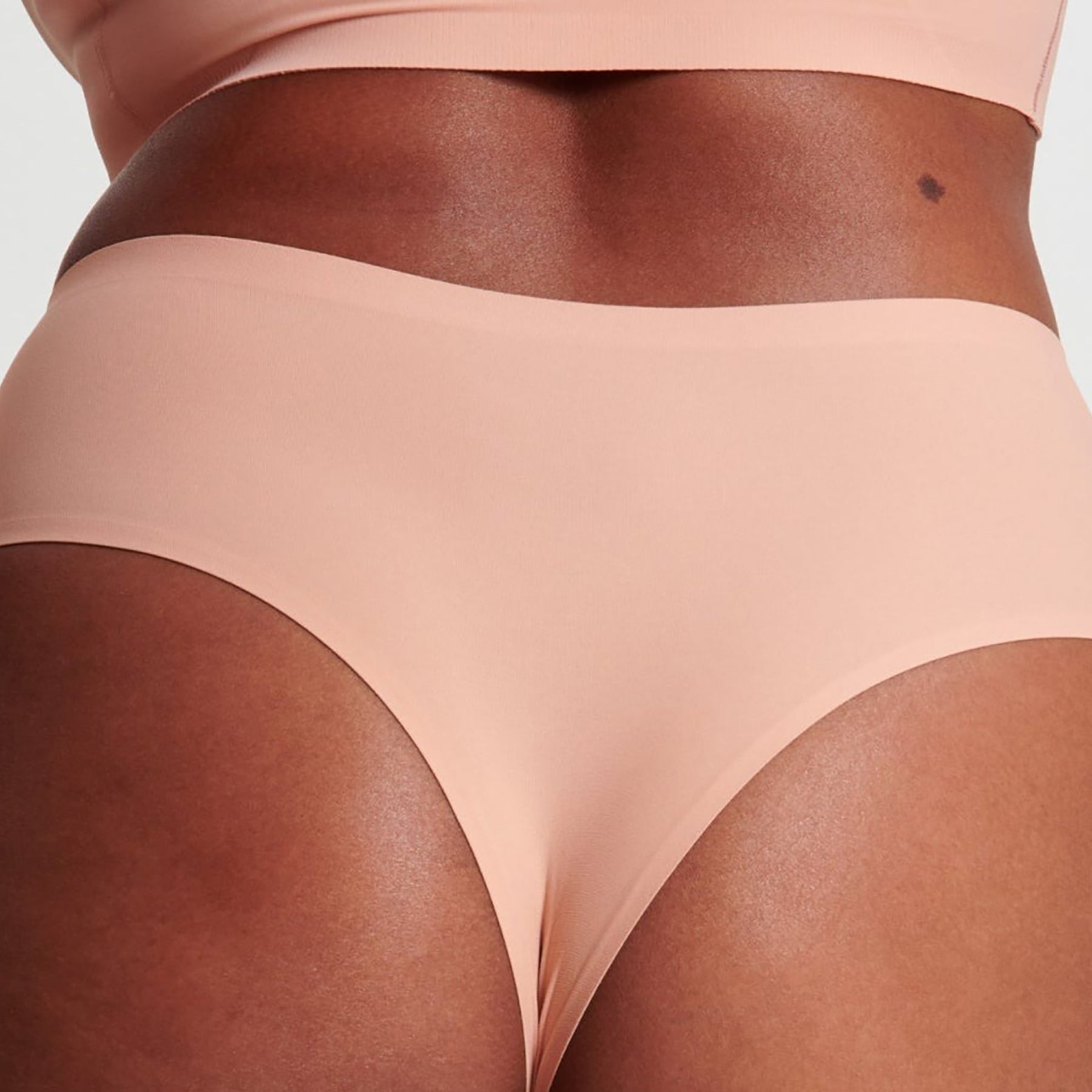 Close-up of waistband and fit on Evelyn & Bobbie Himalayan Salt high rise thong