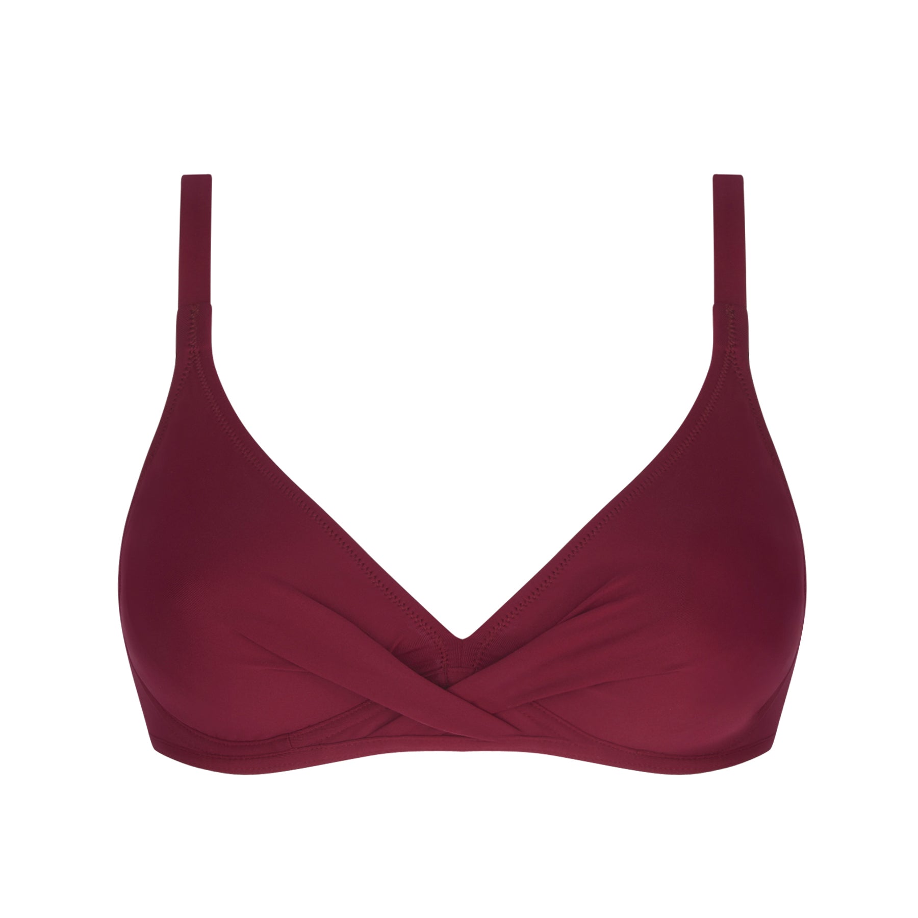 Plum V-neck bikini top with soft pleating at the centre and adjustable straps, worn by model seaside.