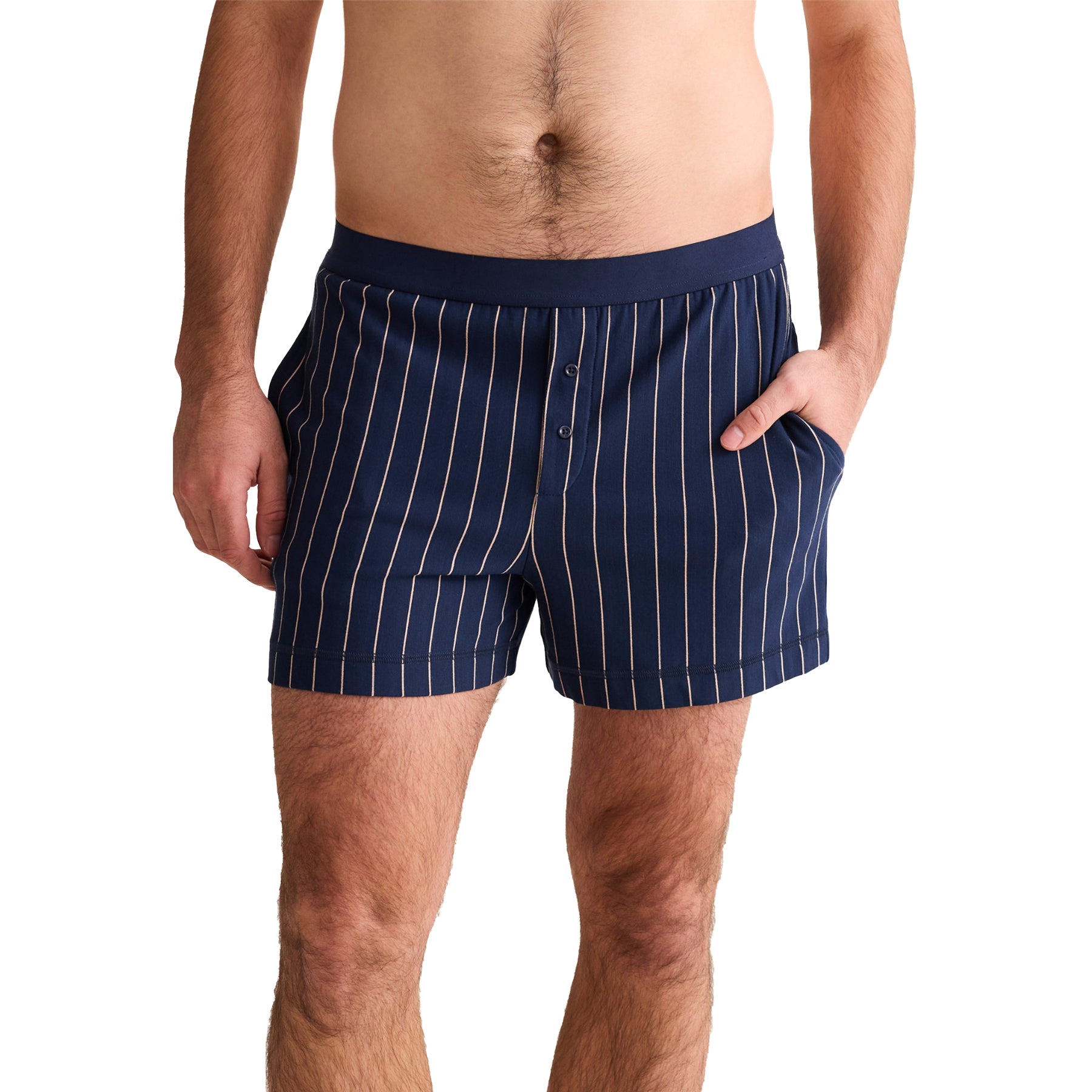 Front view of men’s striped boxers in navy and praline with elastic waistband and button fly.