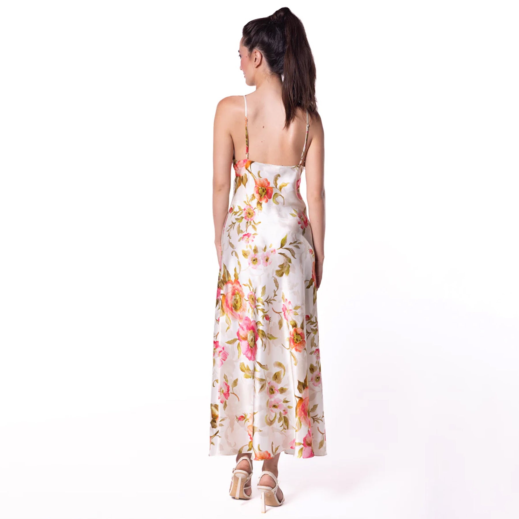 Back view showing the open back and full-length floral satin design of the nightgown.