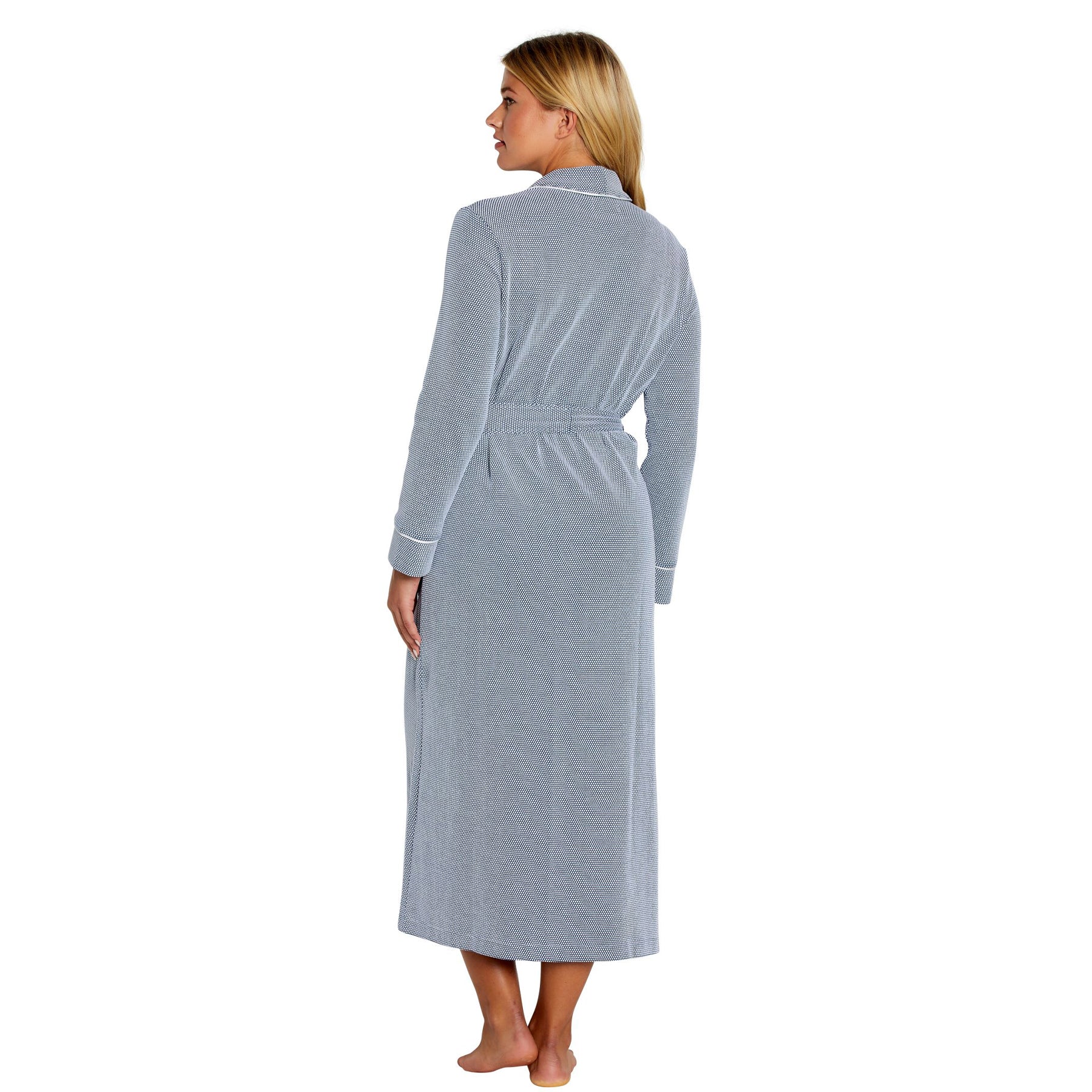 Woman wearing a gray robe on a white background