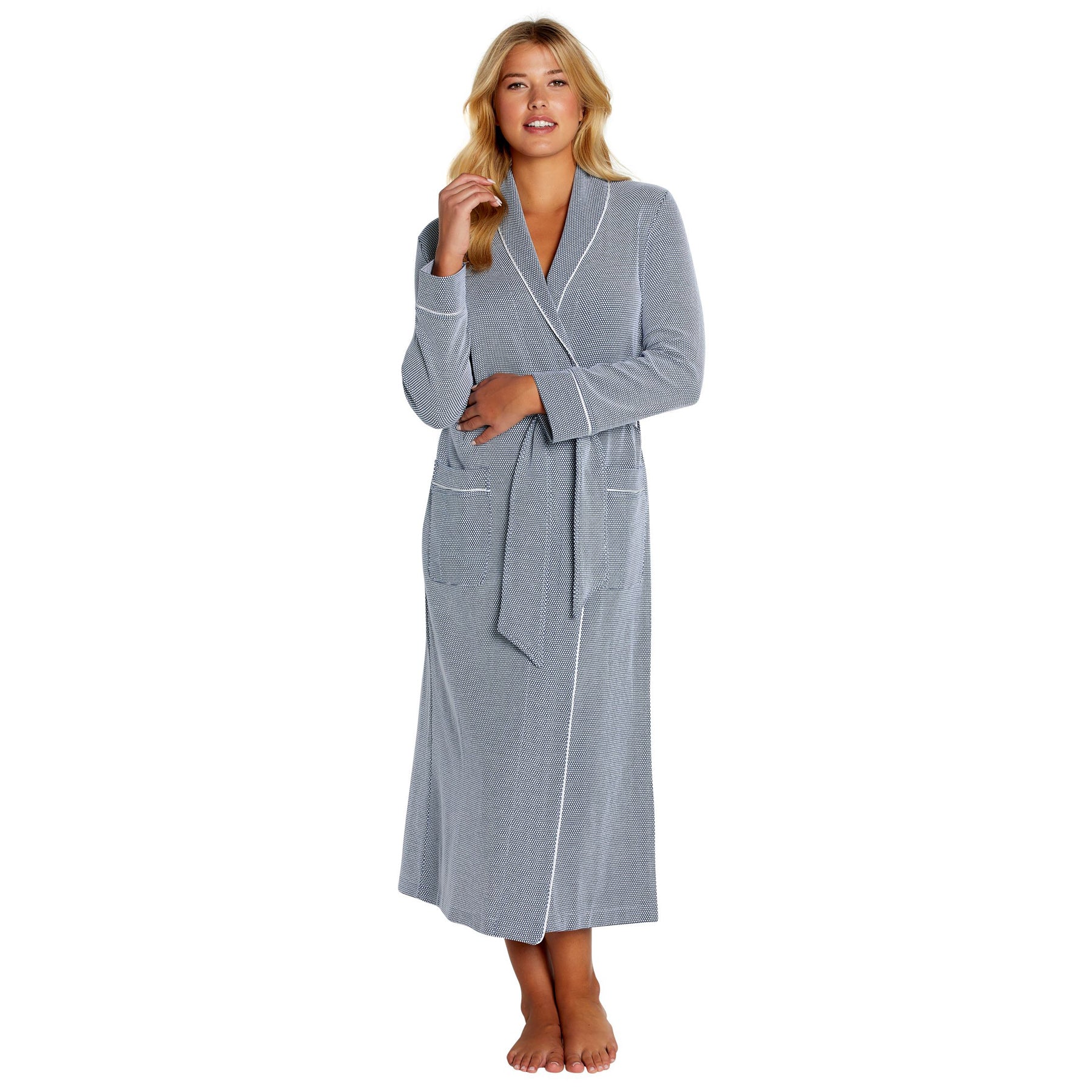 Woman wearing a gray robe on a white background