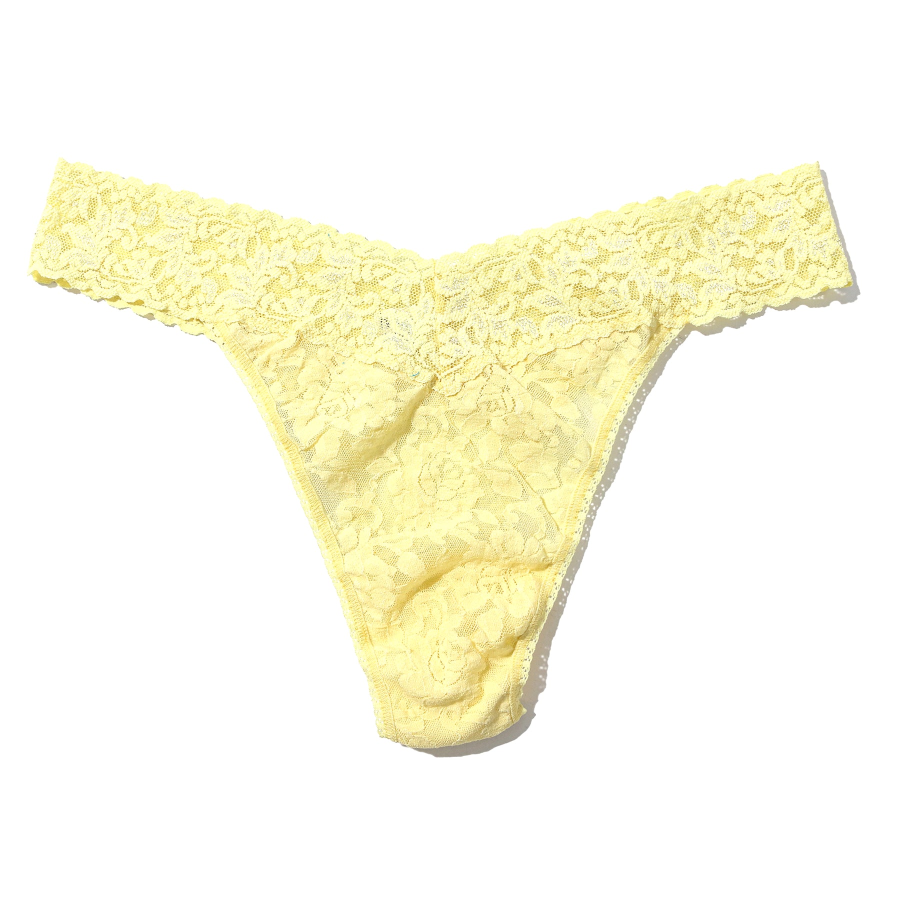 Hanky Panky lace original rise thong in  it's bananas pale yellow, flat lay without model.