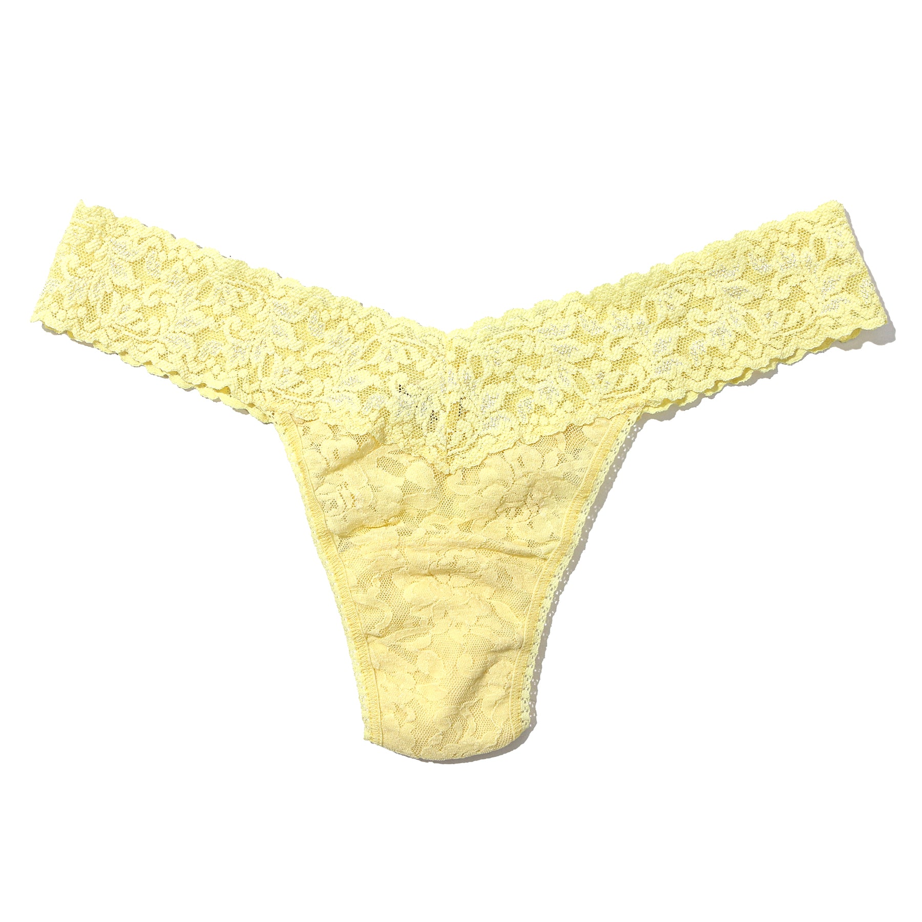 Hanky Panky lace low rise thong in it's bananas pale yellow, flat lay without model.