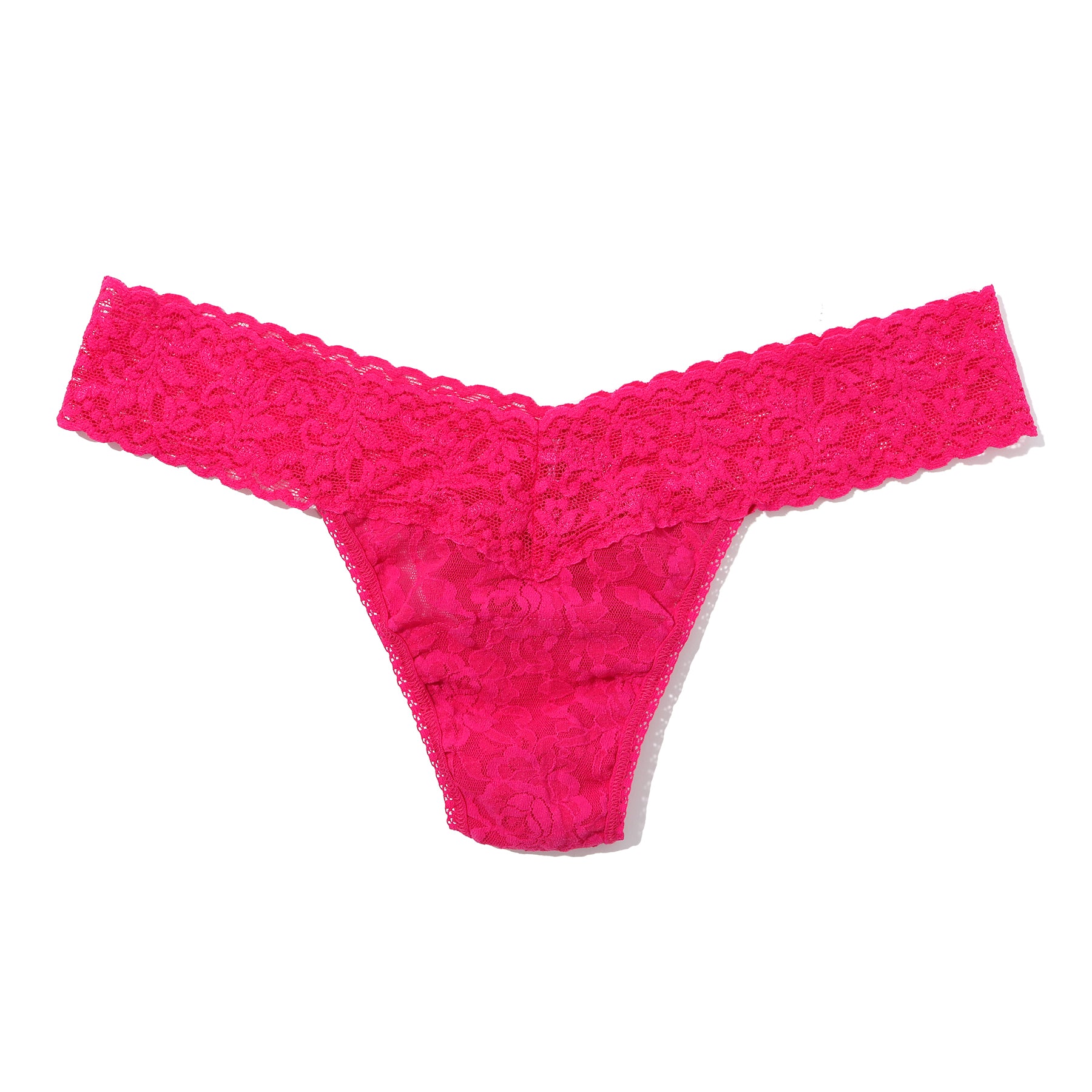 Bright fuchsia lace low rise thong with scalloped lace waistband and soft floral stretch lace on a white background