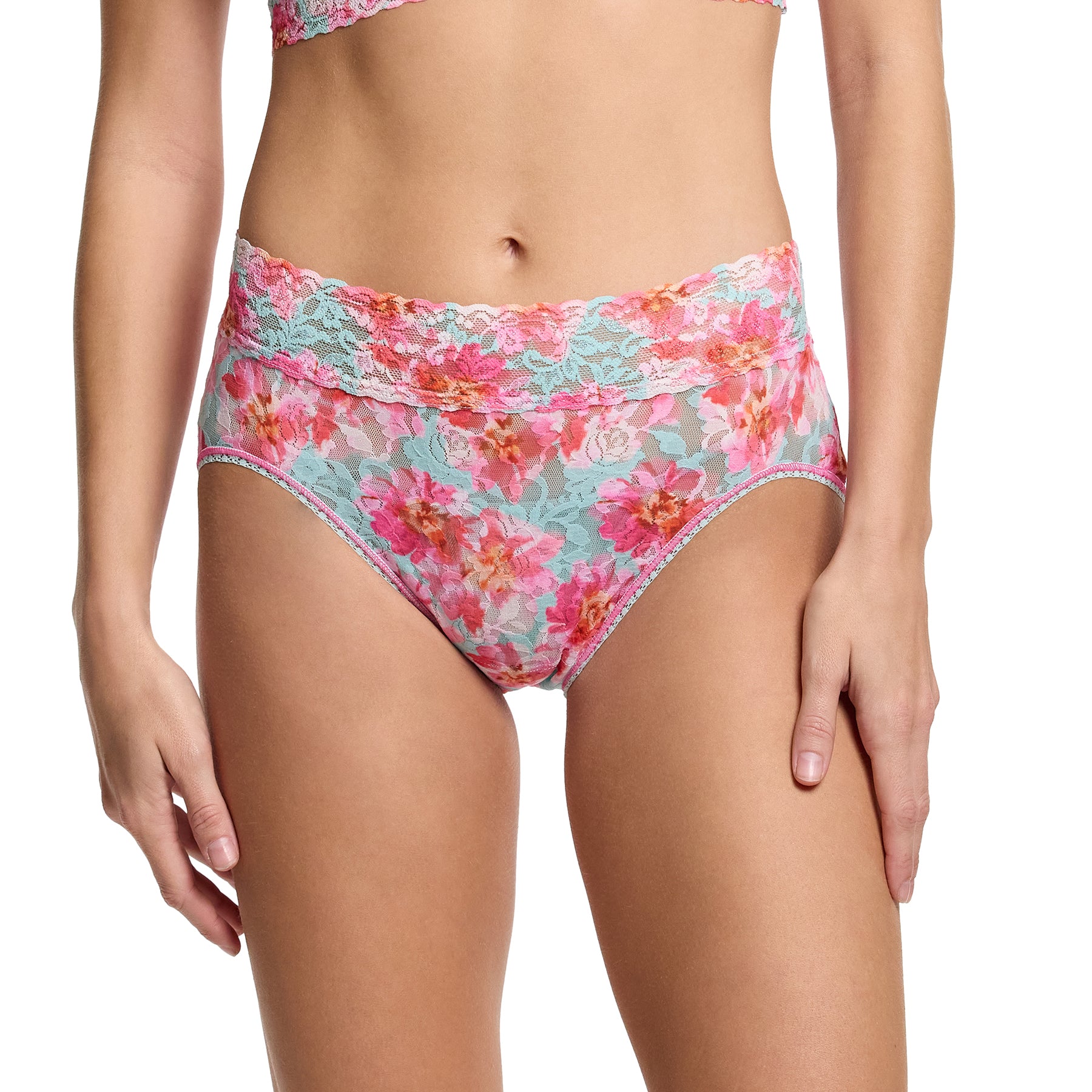 Hanky Panky printed lace french full brief in first bloom, pink and orange florals on a blue aqua background. Front view on model.