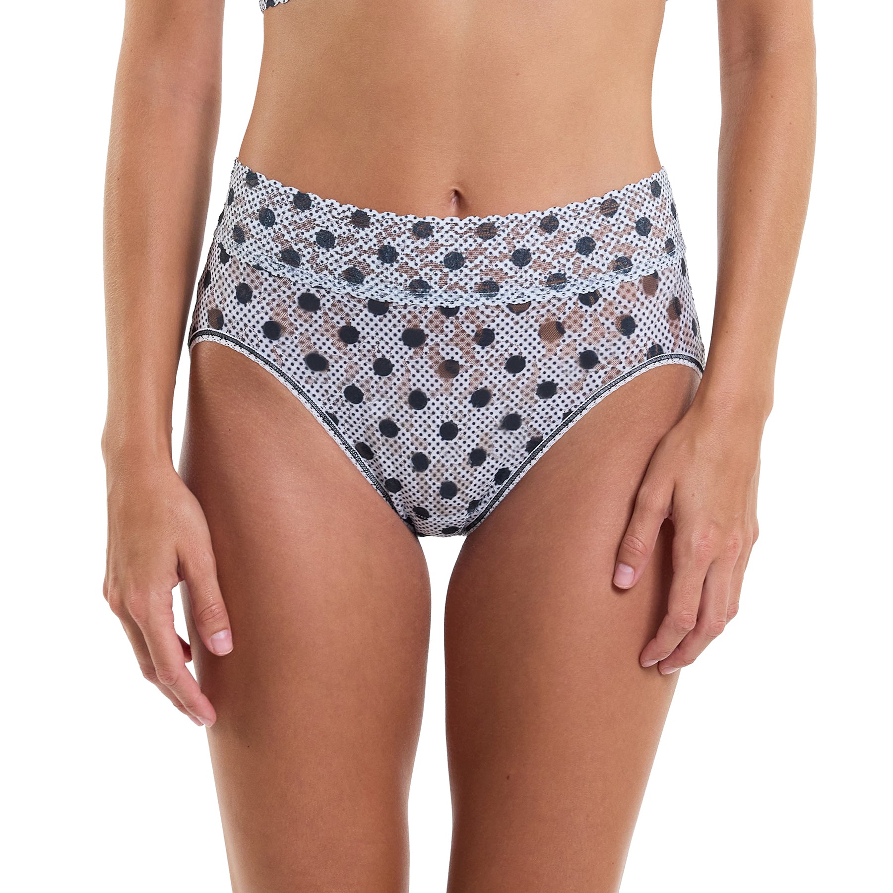 French cut full brief in Pinpoint black polka dot printed lace on white background. Front view on model.