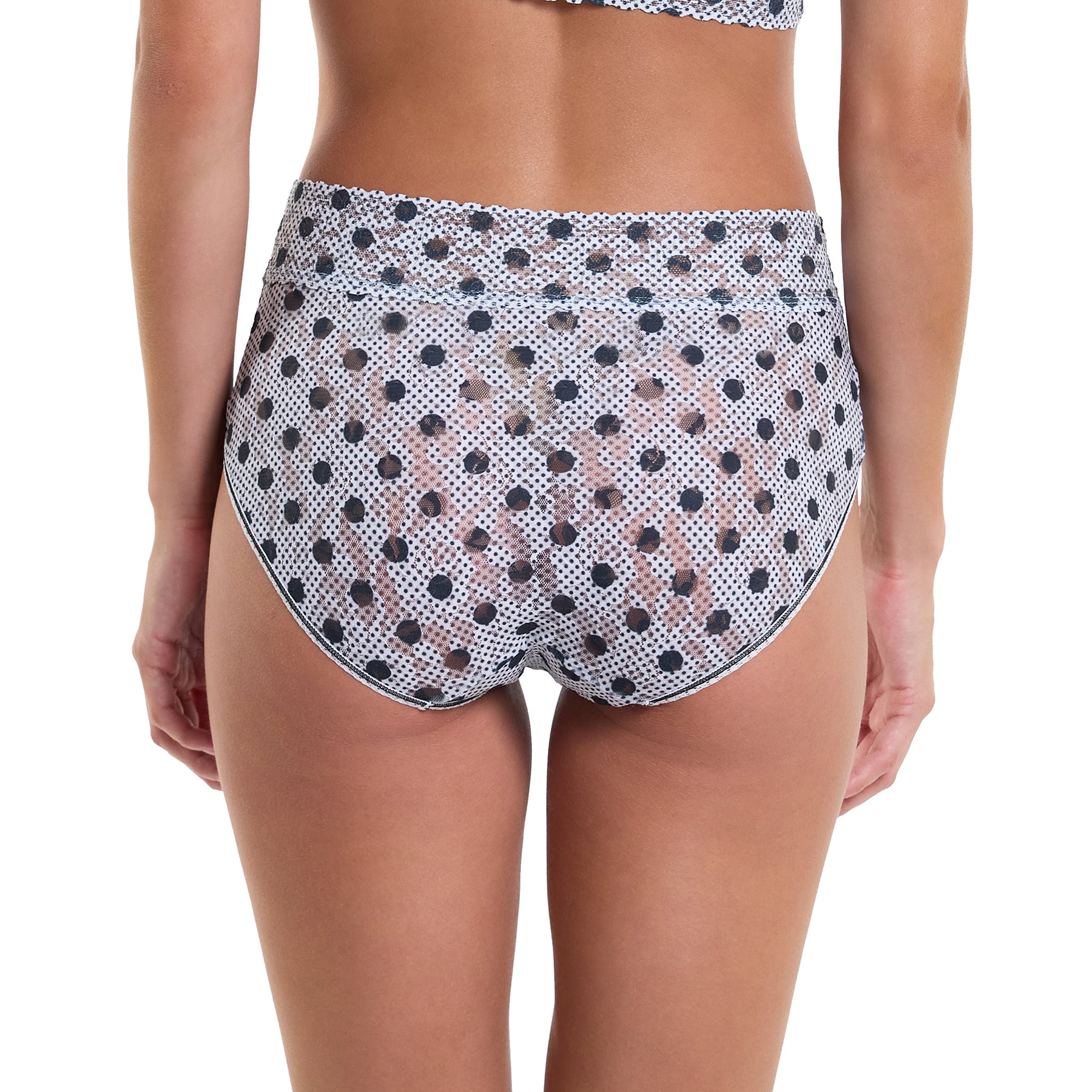 French cut full brief in Pinpoint black polka dot printed lace on white background. Rear view on model.