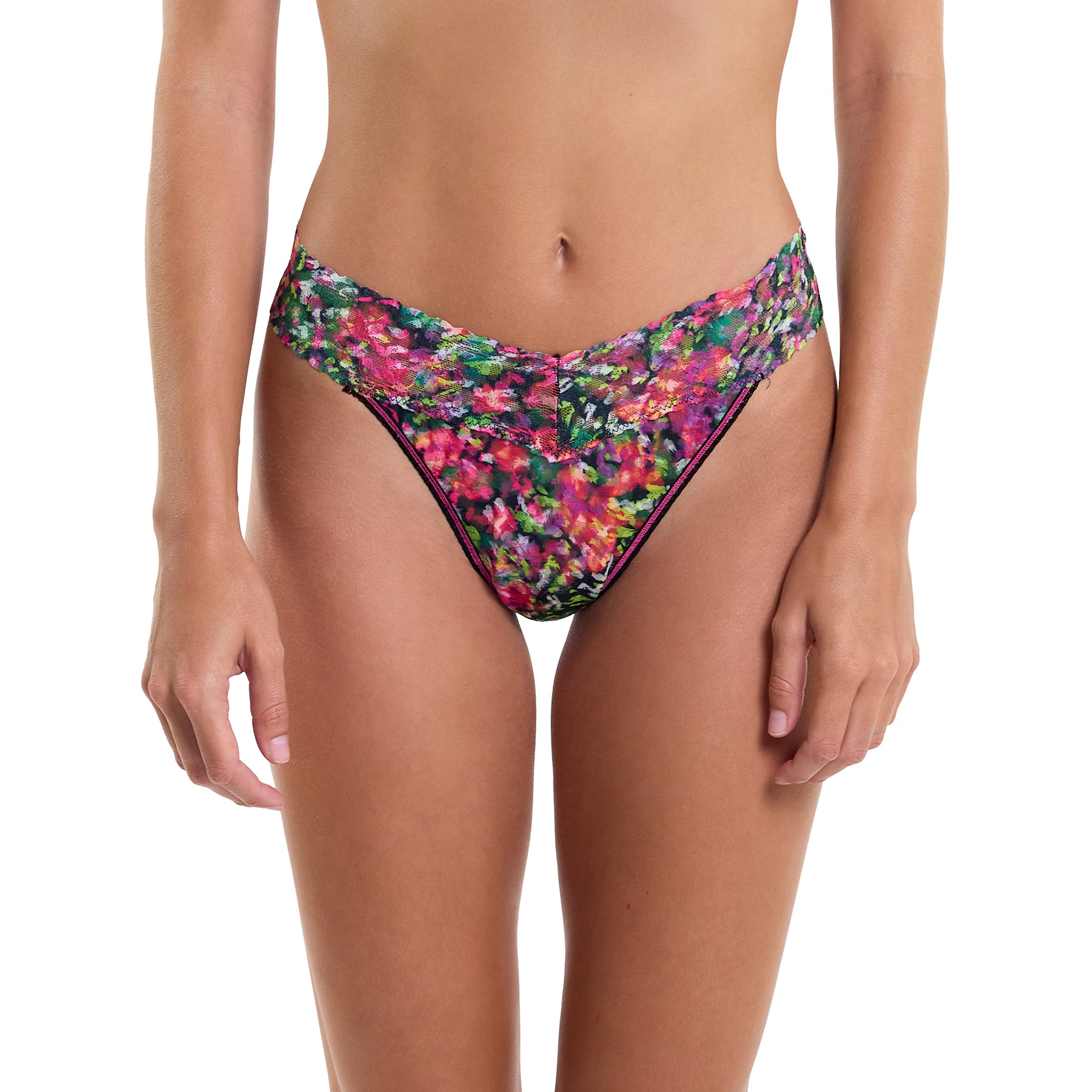 Original rise printed lace thong in Celebration multicolour floral print on a dark background. Front view on model.