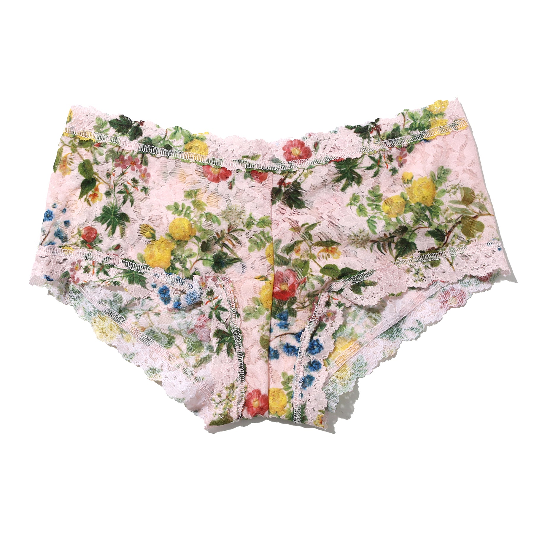 Printed lace boyshort in pink, green and blue florals on a light pink background. Flat lay without model.