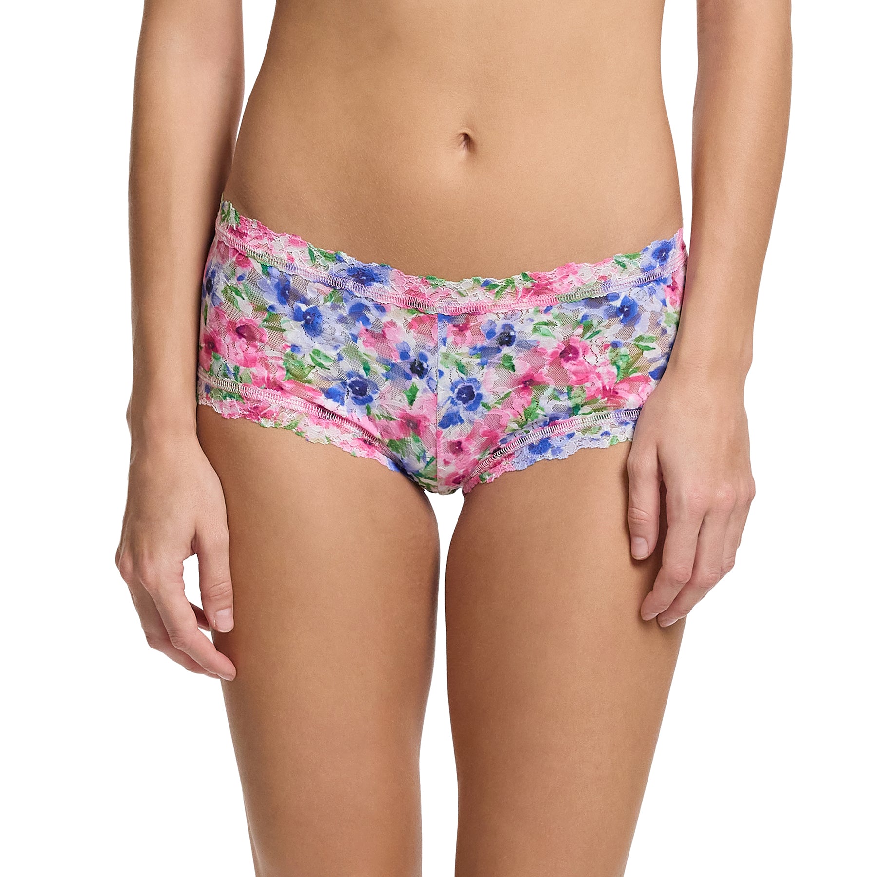 Hanky Panky printed mid-rise boyshort in paint and pour: pink, green and blue florals on a white background, front view on model.