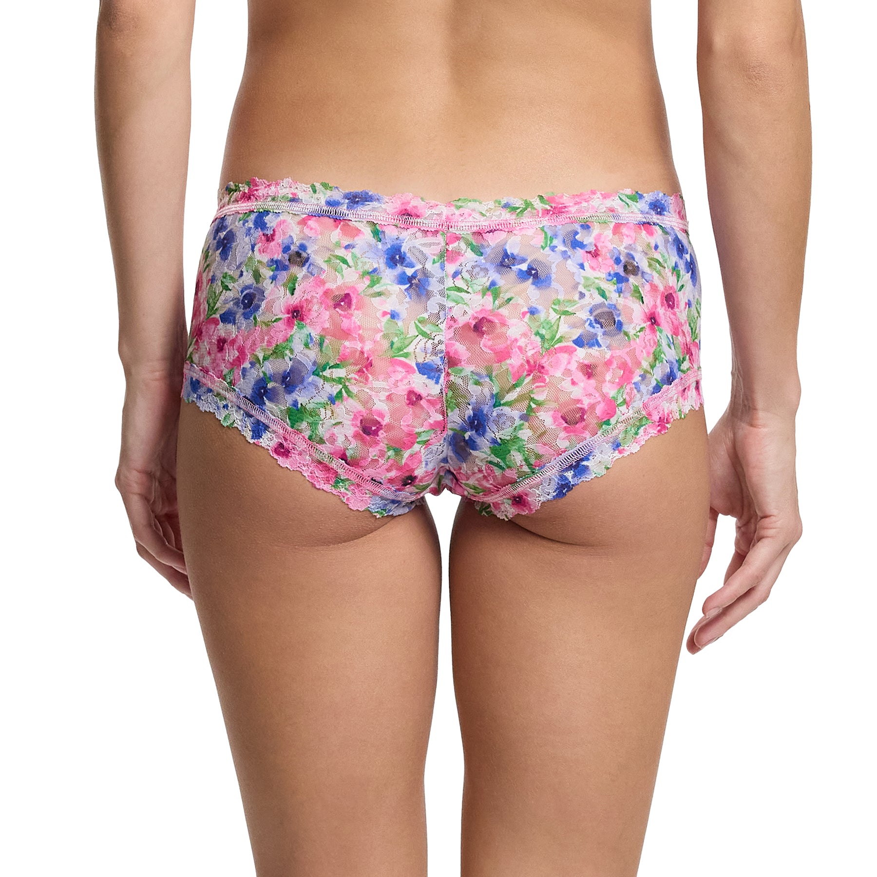 Hanky Panky printed mid-rise boyshort in paint and pour: pink, green and blue florals on a white background, rear view on model.