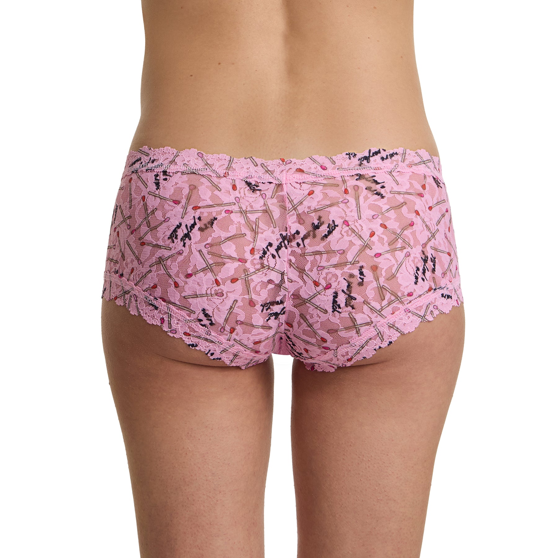 Back view of model wearing pink printed lace boyshort in the Perfect Match pattern with full lace coverage and scalloped edges