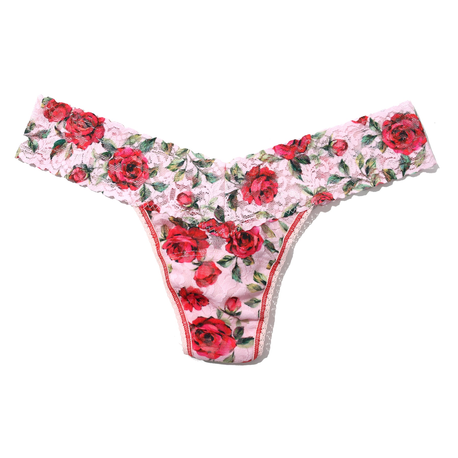 Je t'aime floral red/green rose printed lace low rise thong on a light pink background. Front view without model.