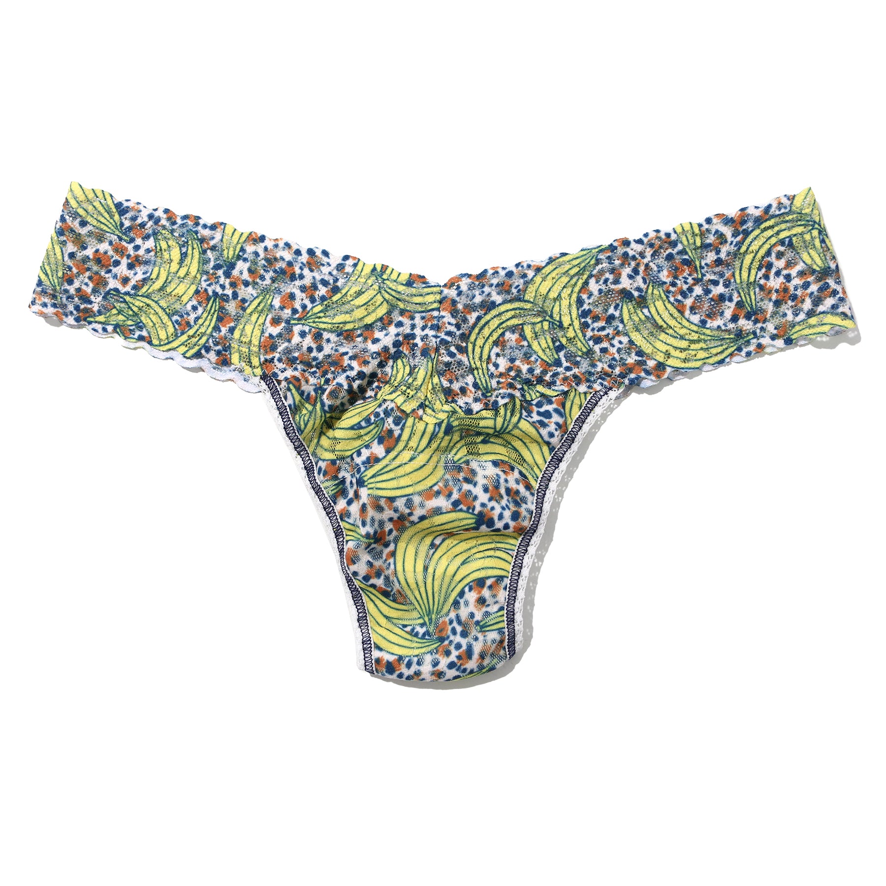 Hanky panky printed lace low rise thong in pick me, yellow banana print on a brown and navy dot print background. Front view without model.