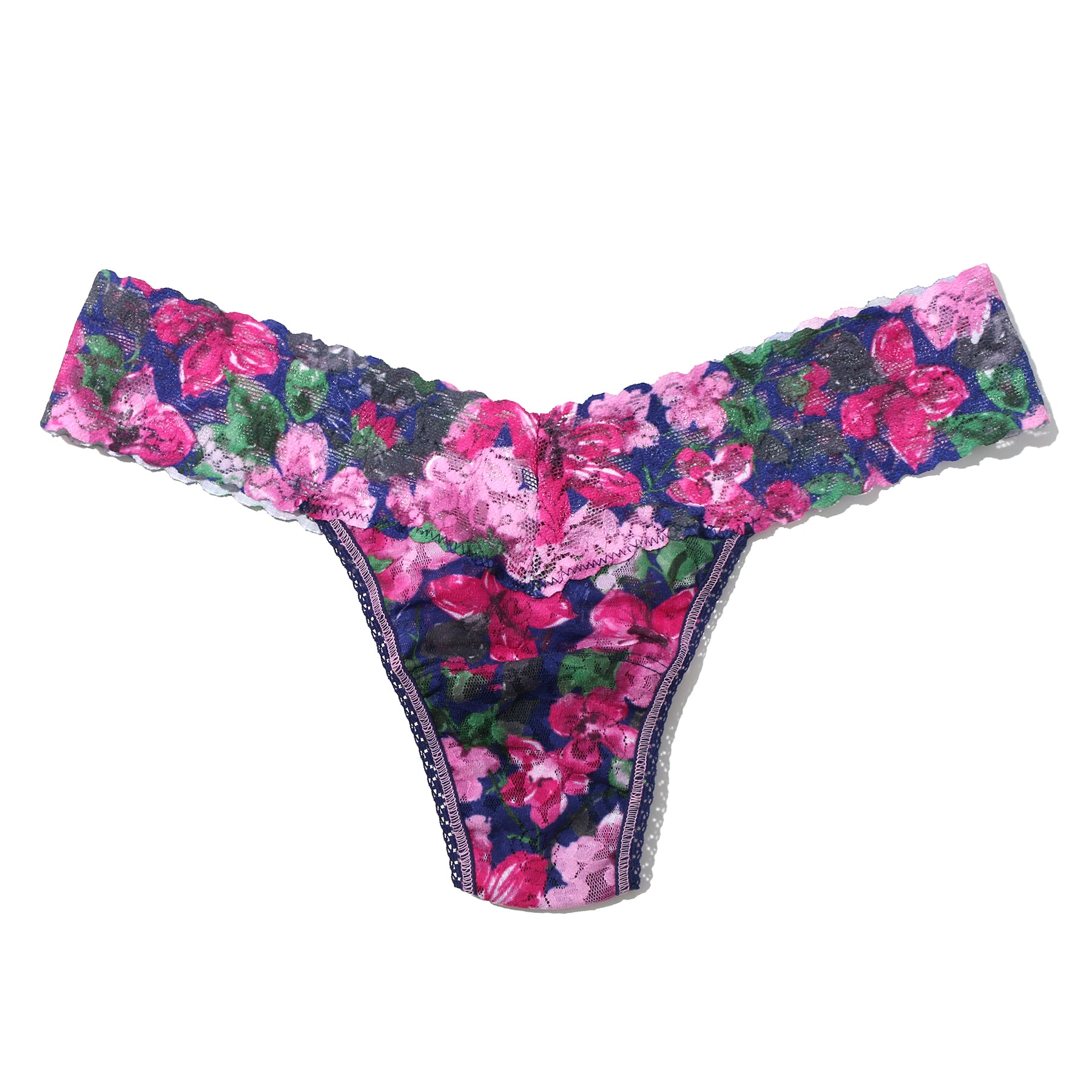 Printed lace low rise thong in tis the season, pink and green florals on a navy background. Flay lay without model.