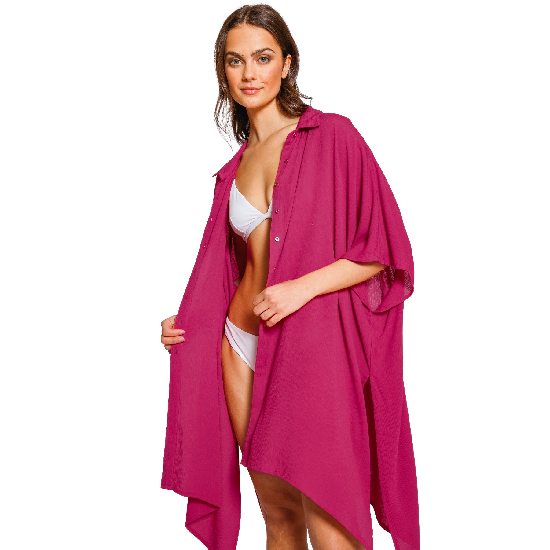 Sangria pink resort cover-up styled open over a bikini, featuring fluid fabric and an elegant oversized fit.