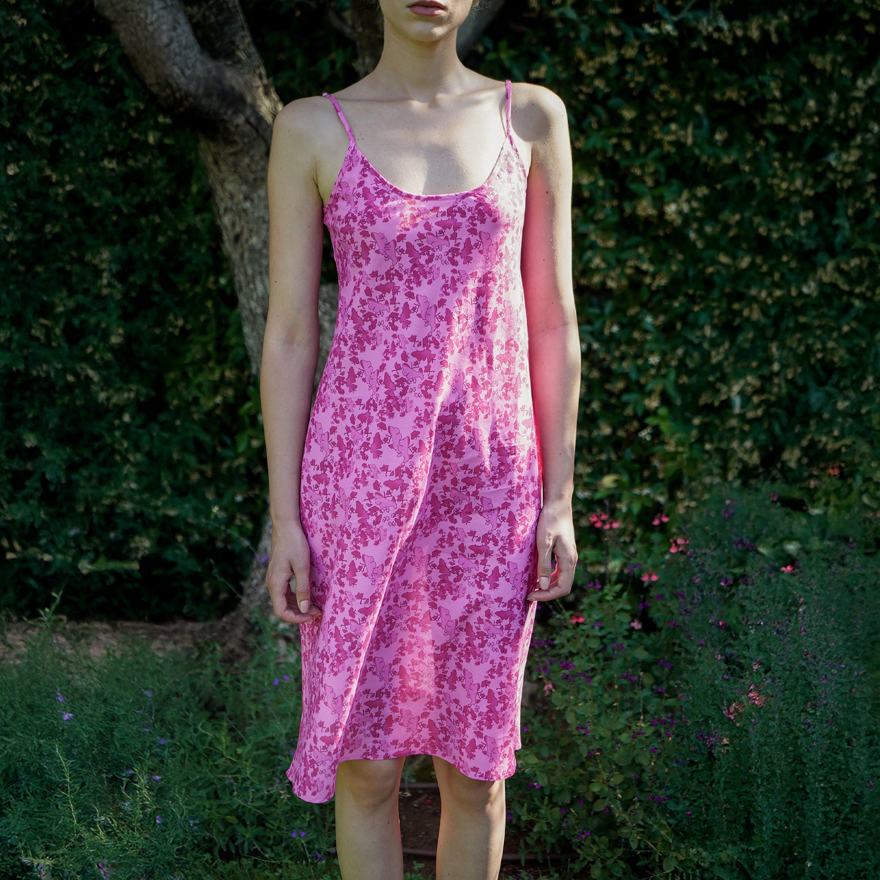 Chocho rose hot pink printed cotton spaghetti strap chemise. Front view on model.