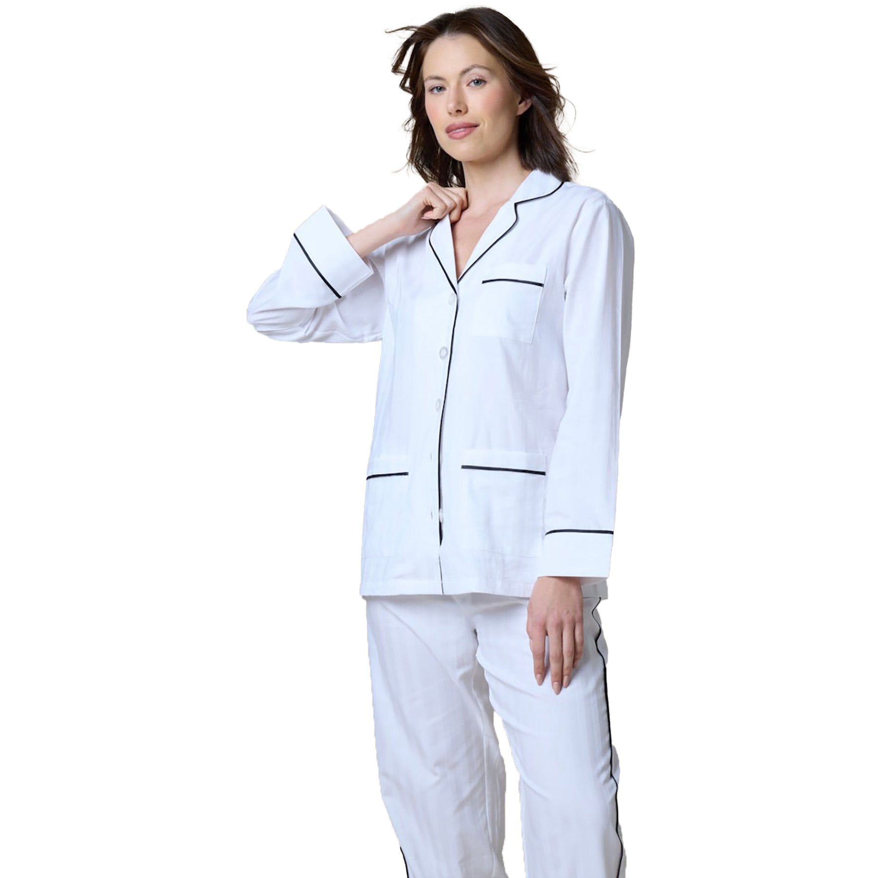 White cotton classic pyjama set with contrast black piping. Front view closeup on model.