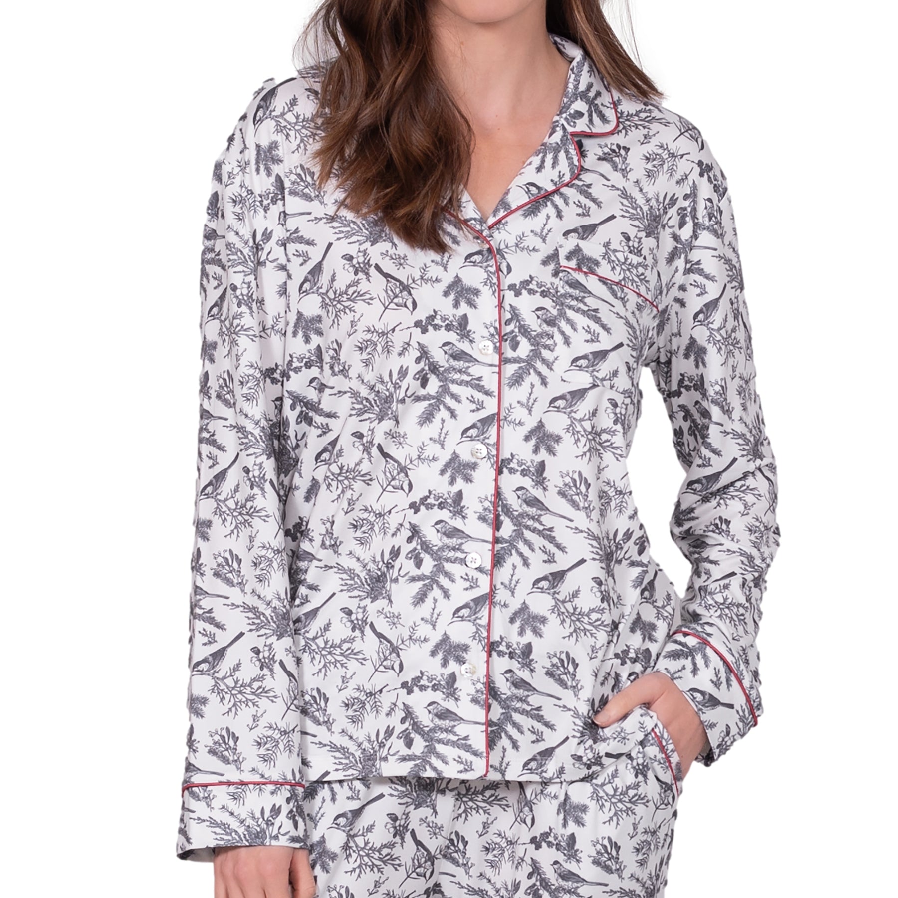 Close-up of LatteLove bird and branch print pajama top with red piping and button front.