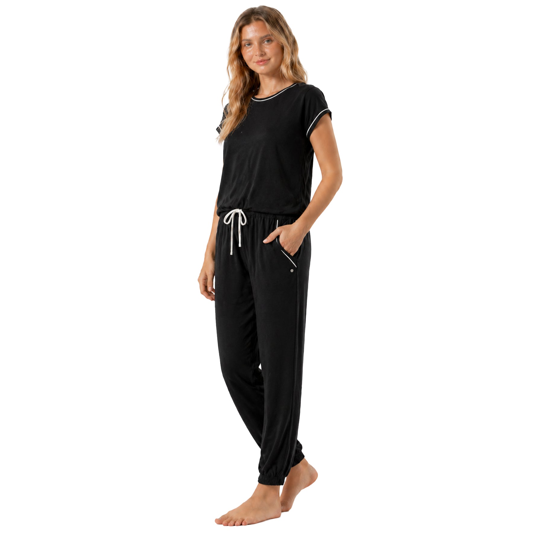 Black lounge pyjama set with contrast white trim, soft short sleeve top and jogger pants, relaxed side view