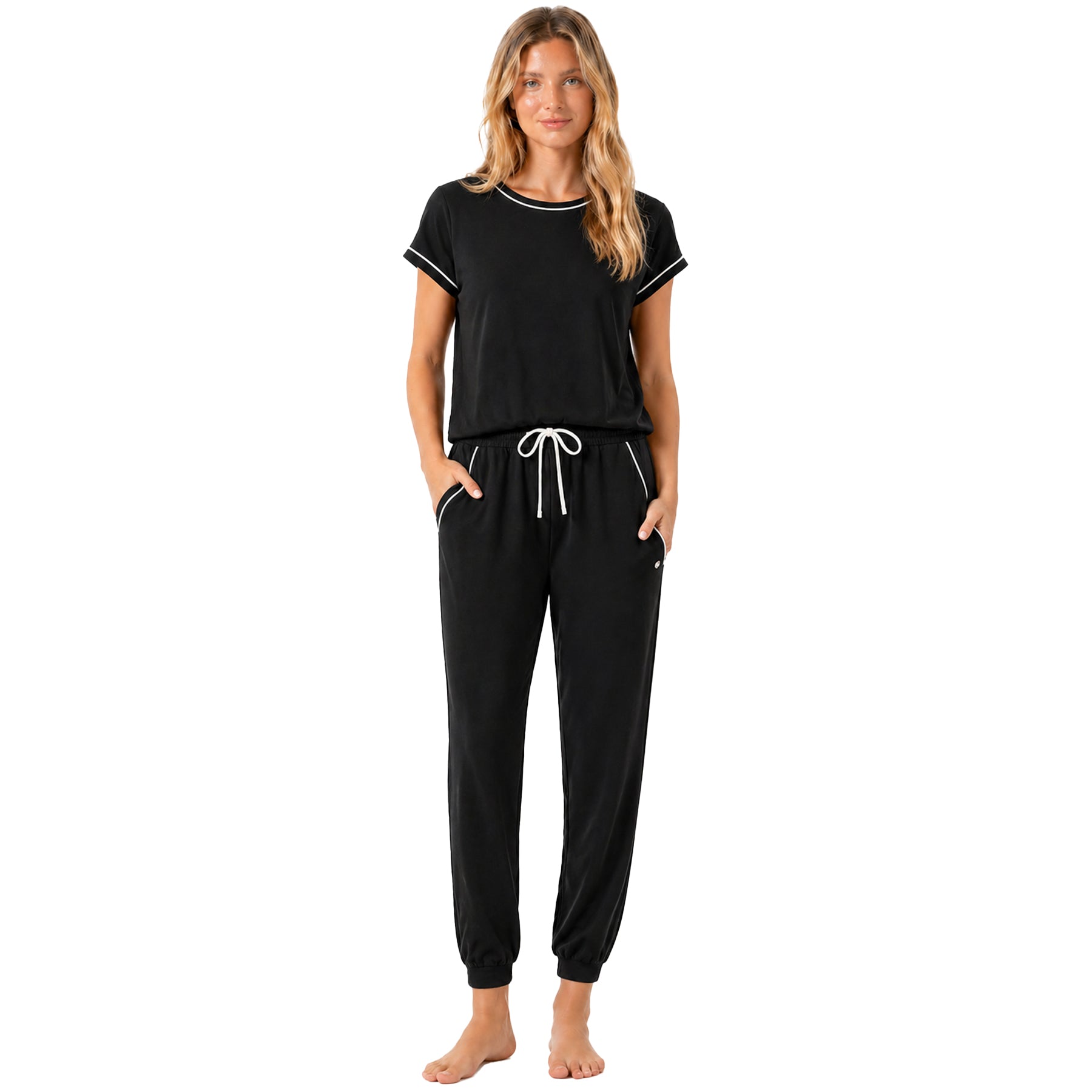 Black women’s pyjama set with white piping, short sleeve top and elastic waist jogger pants, full front view