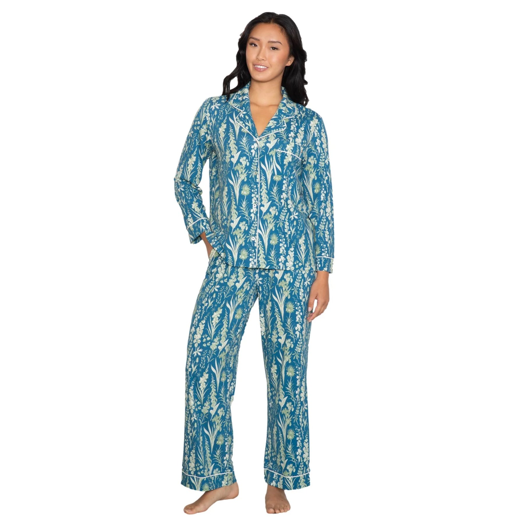 Teal floral print long sleeve pyjama set with button-down top and wide-leg pants, front view on model