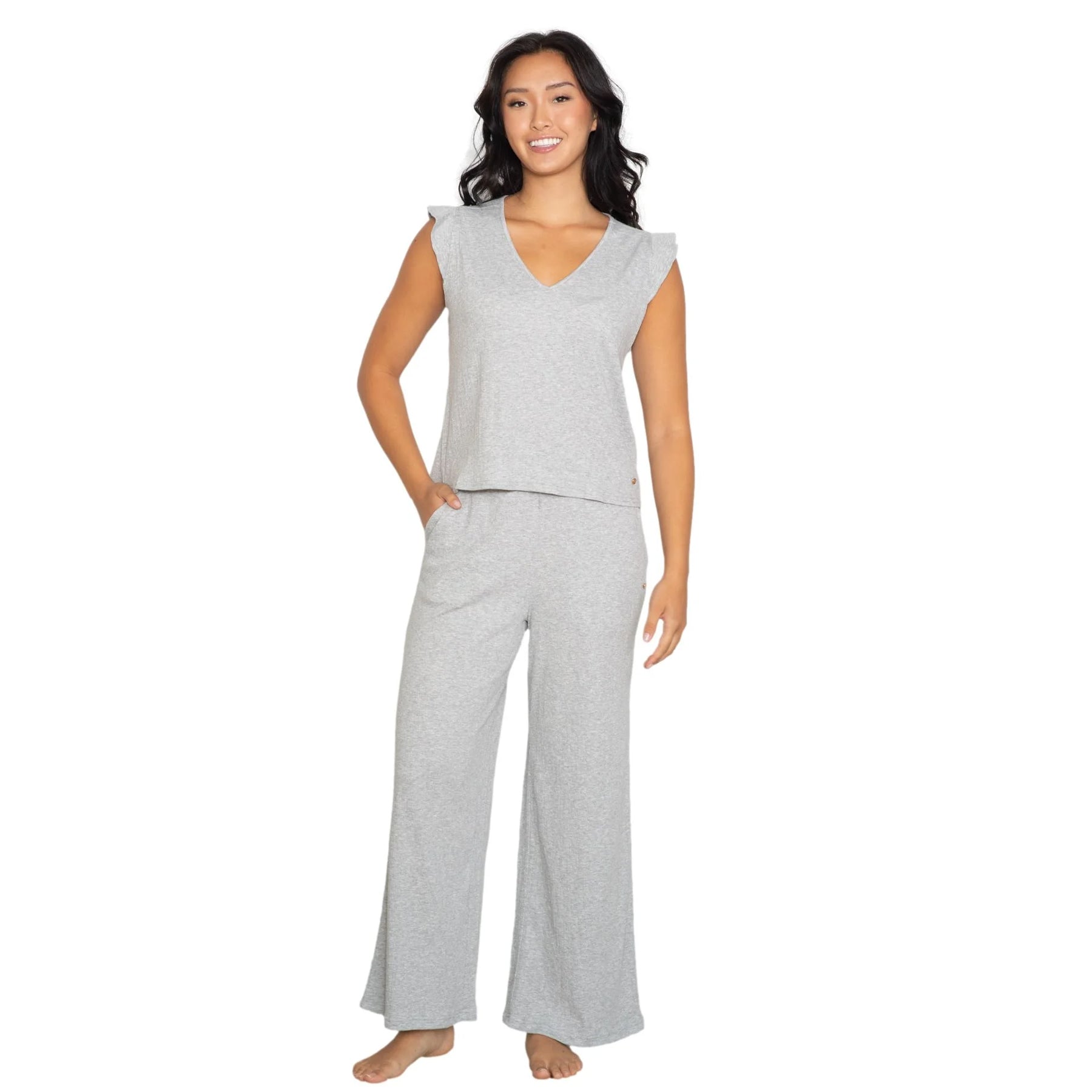 Soft grey knit lounge set with relaxed fit top and flowy wide-leg pants, front view on model