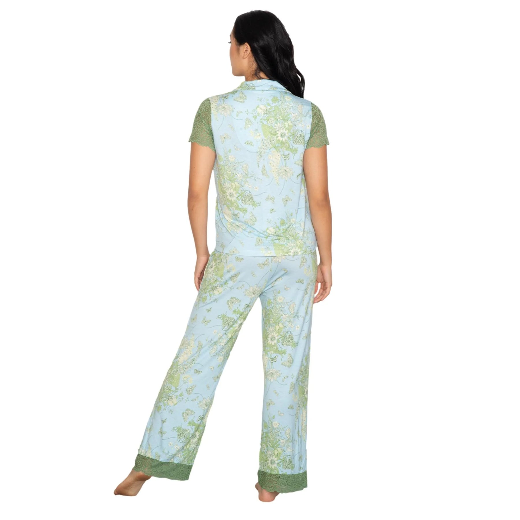 Back view of floral print pajama set in light blue with green lace accents on sleeves and pant hem, relaxed silhouette sleep set
