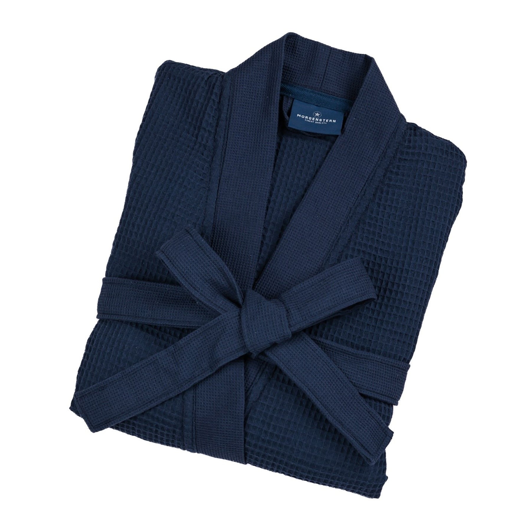 Folded navy waffle cotton robe by Morgenstern – compact and travel-friendly luxury bathrobe.