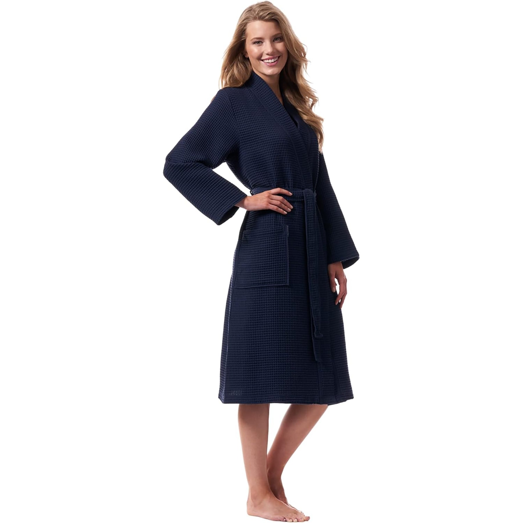 Side profile of woman in navy cotton waffle robe – lightweight and comfortable for home or spa.