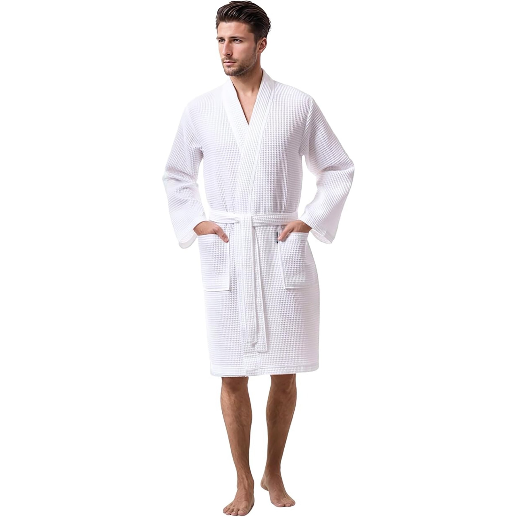 Man wearing white waffle robe with belt and pockets – spa-style cotton bathrobe for men.